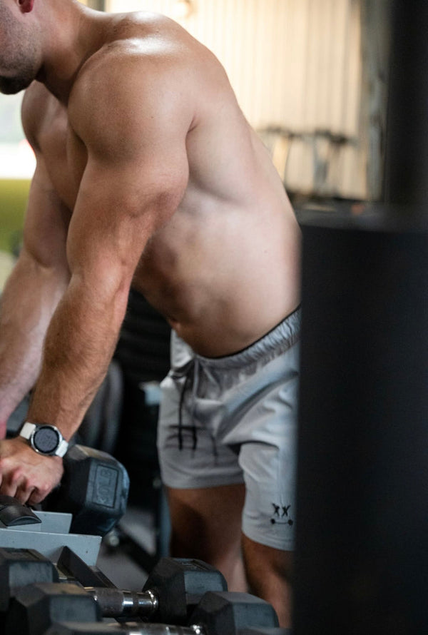 Performance Fabric in Strength Training: Polyester, Lycra, Nylon, and What 4-Way Stretch Actually Means