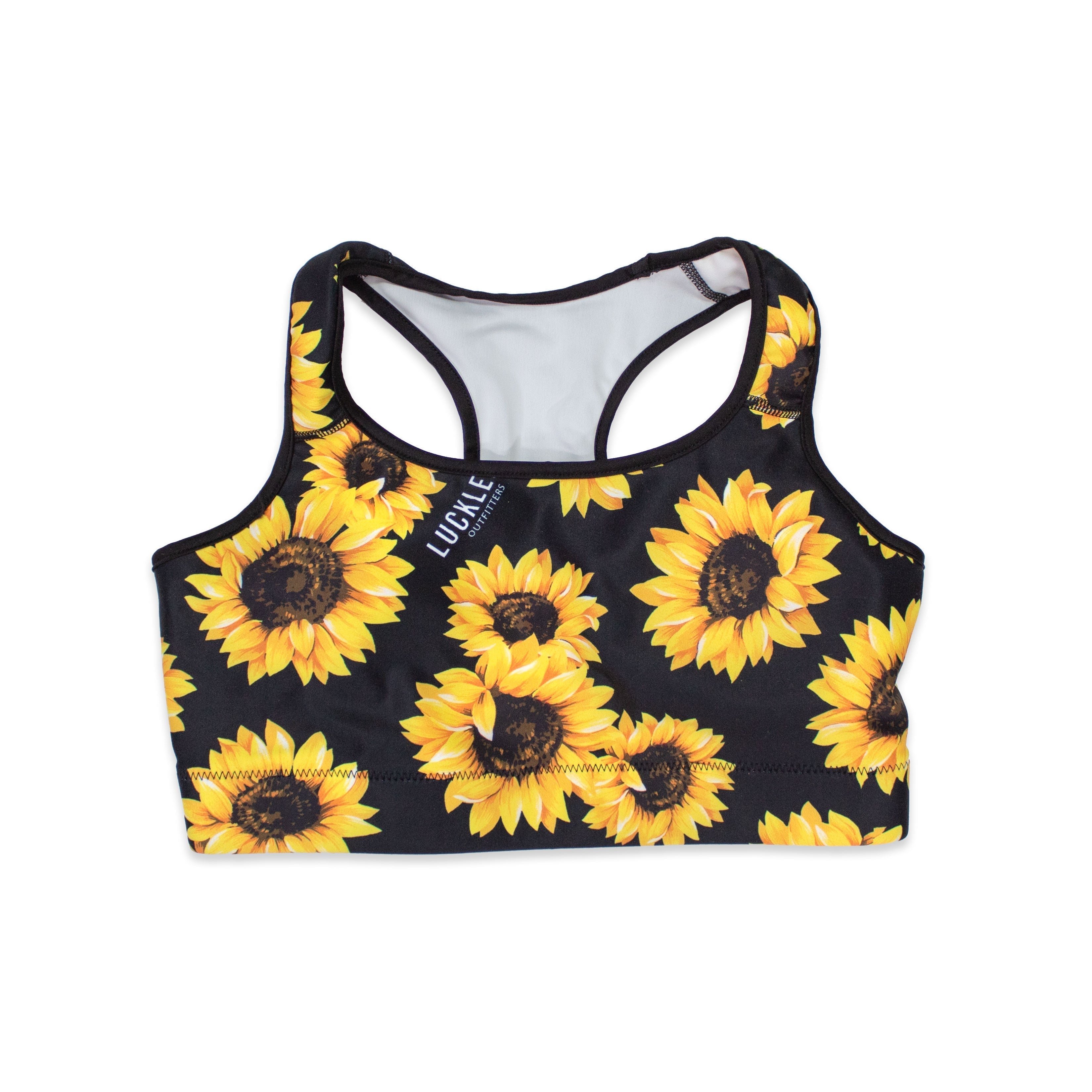 Luckless Outfitters sunflower sports bra — example of a print-on-demand garment in a domestic-blank pipeline