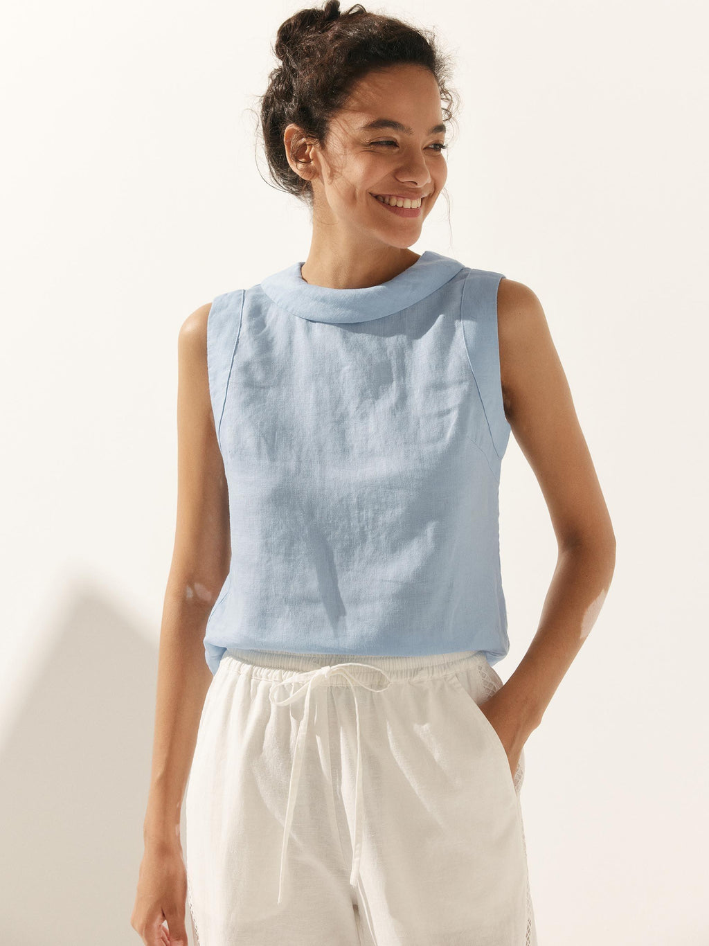 LINTICO 100% Linen Draped Collar Tank Top — product on model
