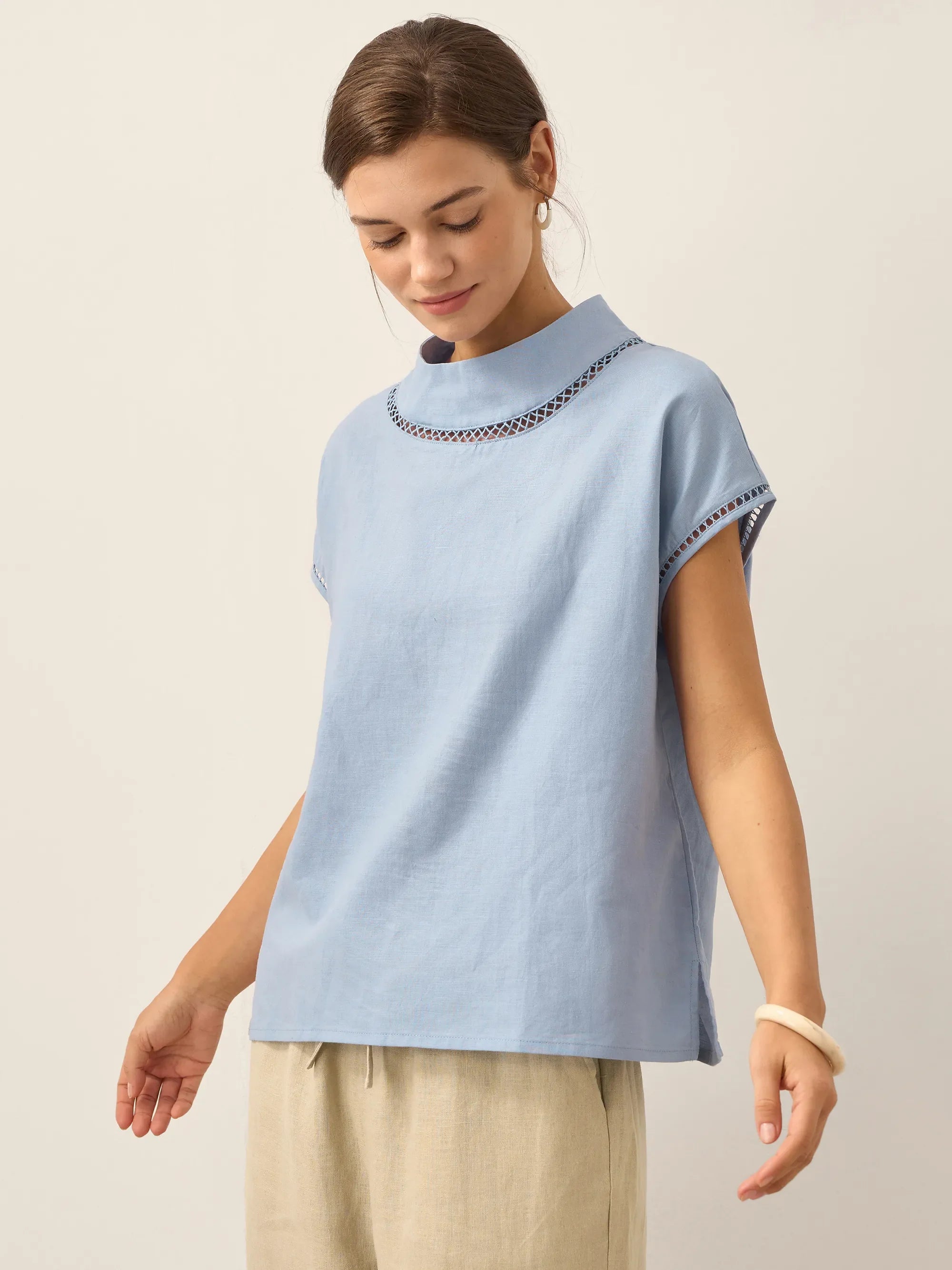 LINTICO Linen Cutout Turtleneck Top QUINN — in-use photo