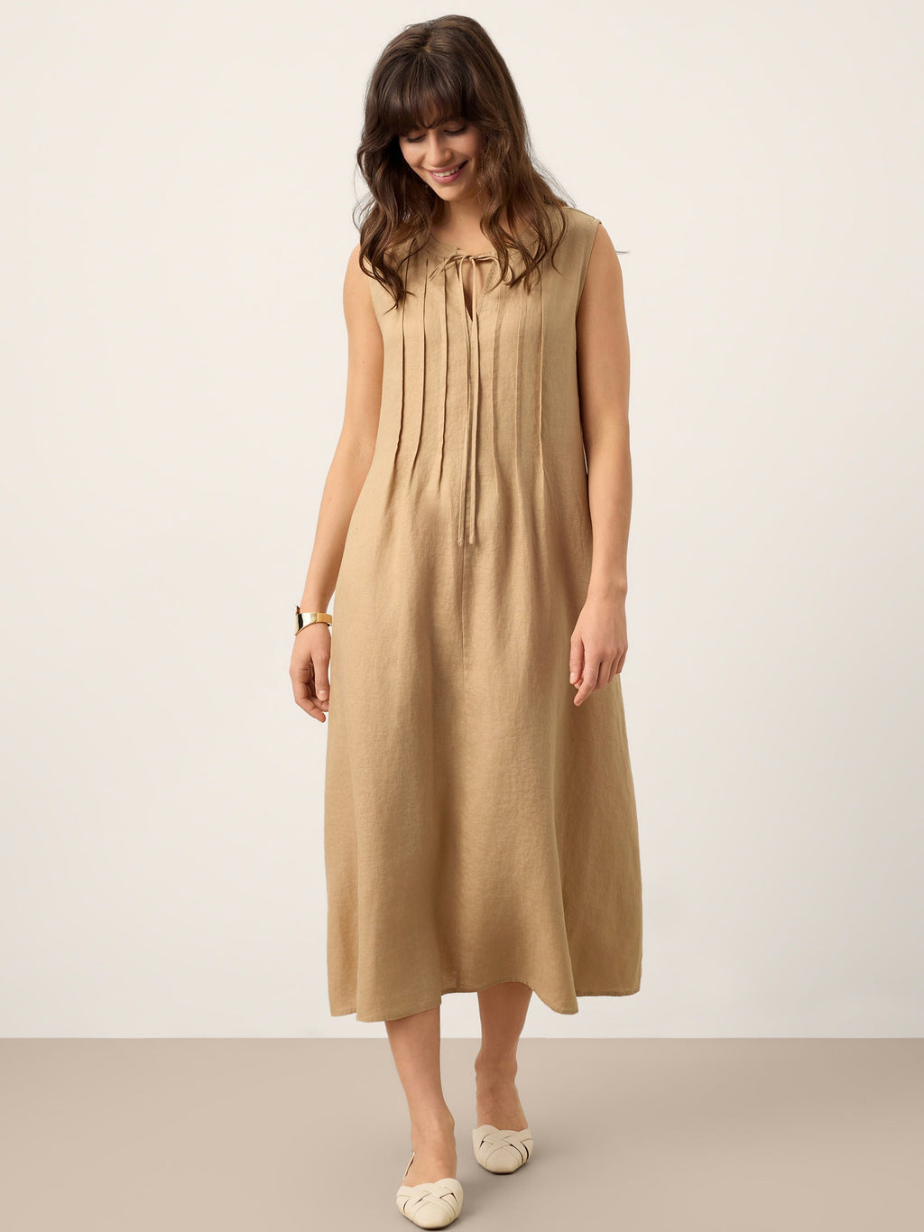 LINTICO 100% Linen Sleeveless Tie-Neck Pintucked Maxi Dress MILLICENT — lifestyle worn / used context