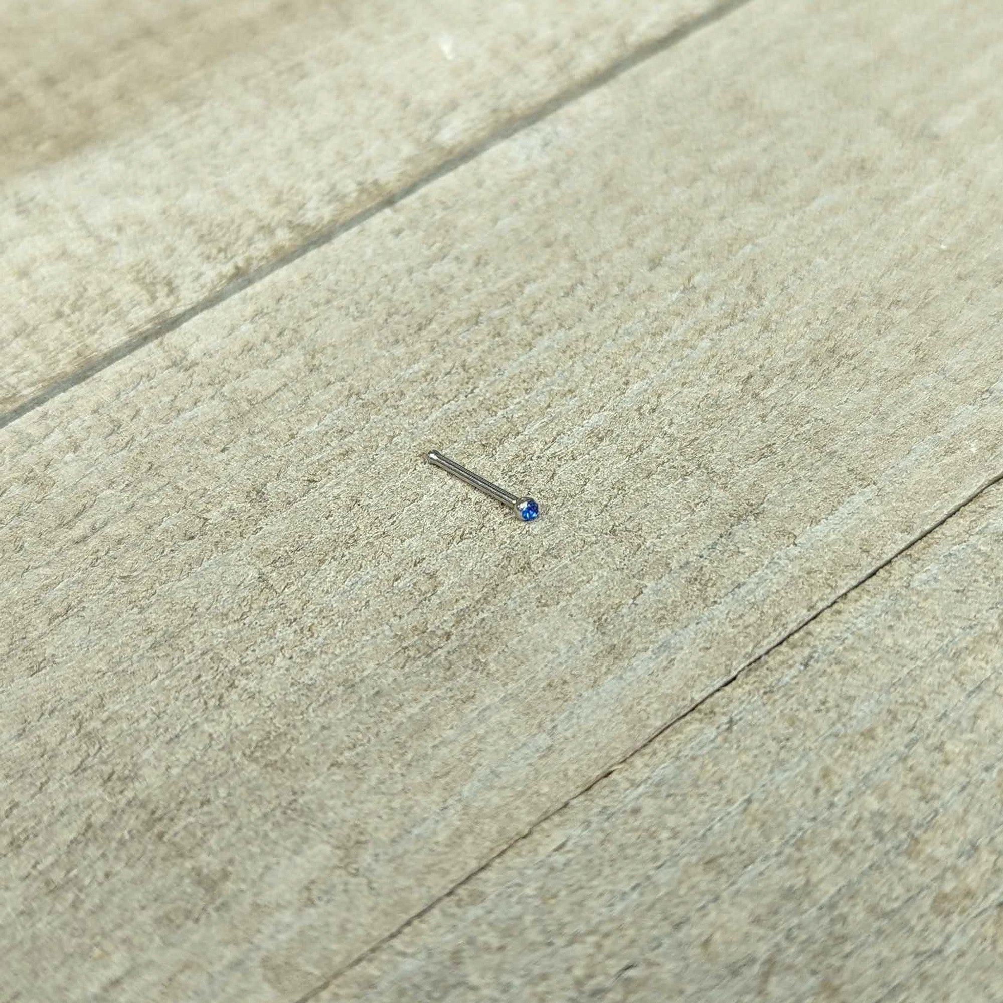 BodyCandy 20G Stainless Steel Sapphire Blue Gem Micro Nose Bone — in-use photo