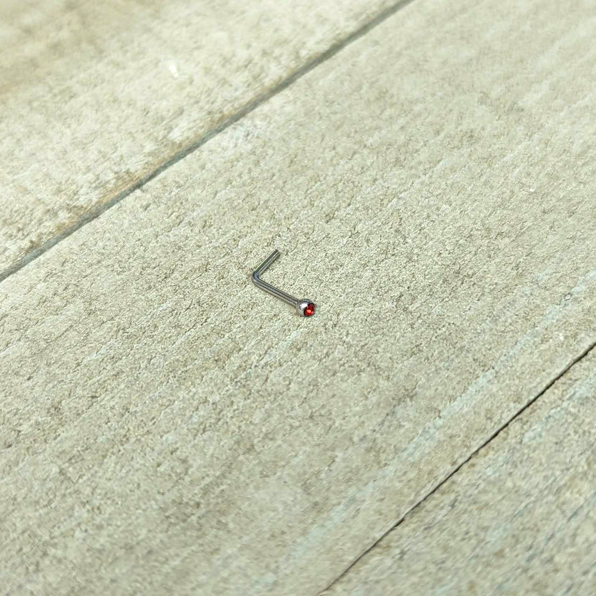 BodyCandy 20G Stainless Steel Ruby Red Gem Micro Nose Ring L-Shaped — in-use photo