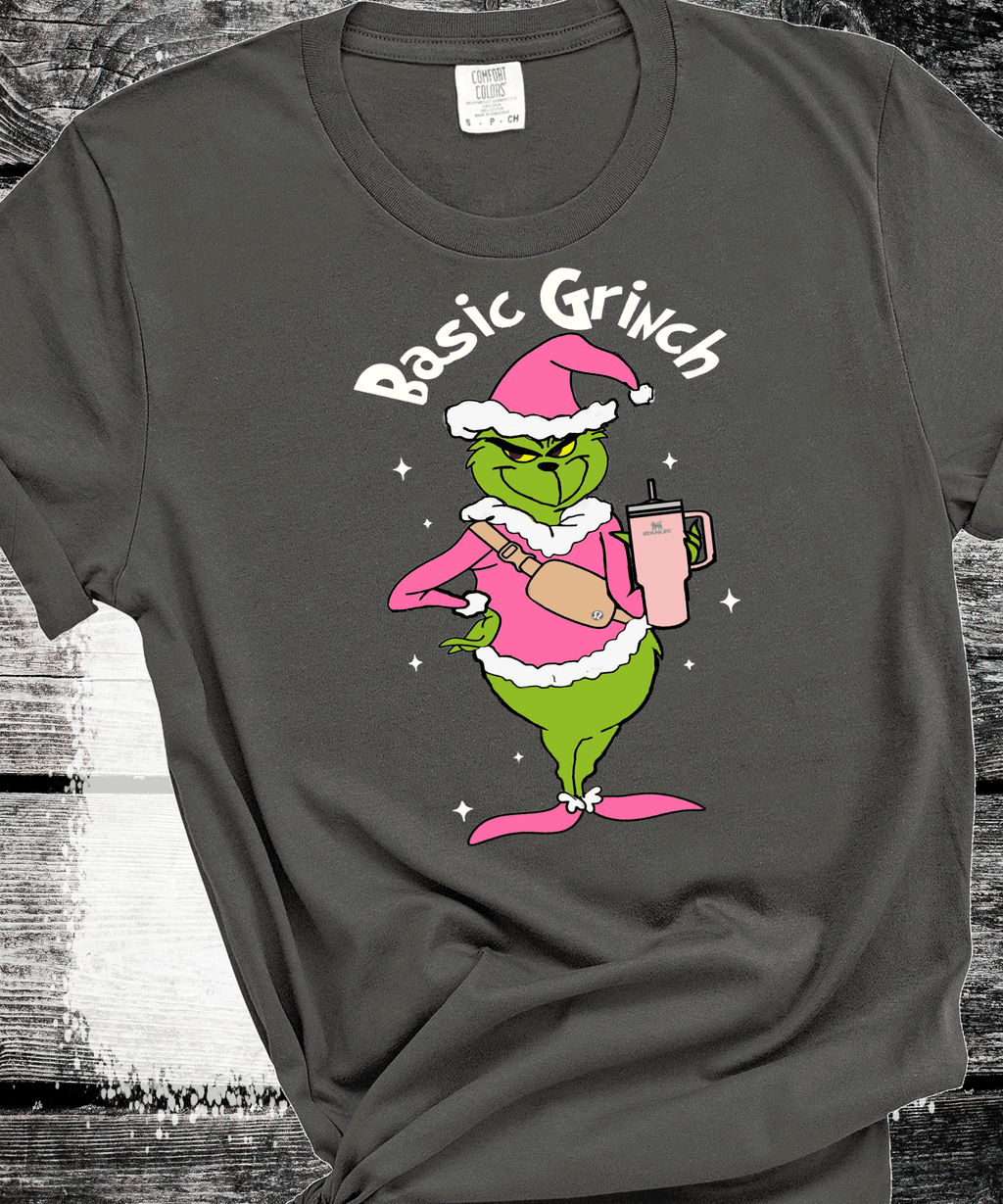A Blessed Texas Mess Boutique Basic Grinch Fanny pack Stanley Cup Pink Grinch Funny Christmas Grinch Shirt — detail and construction