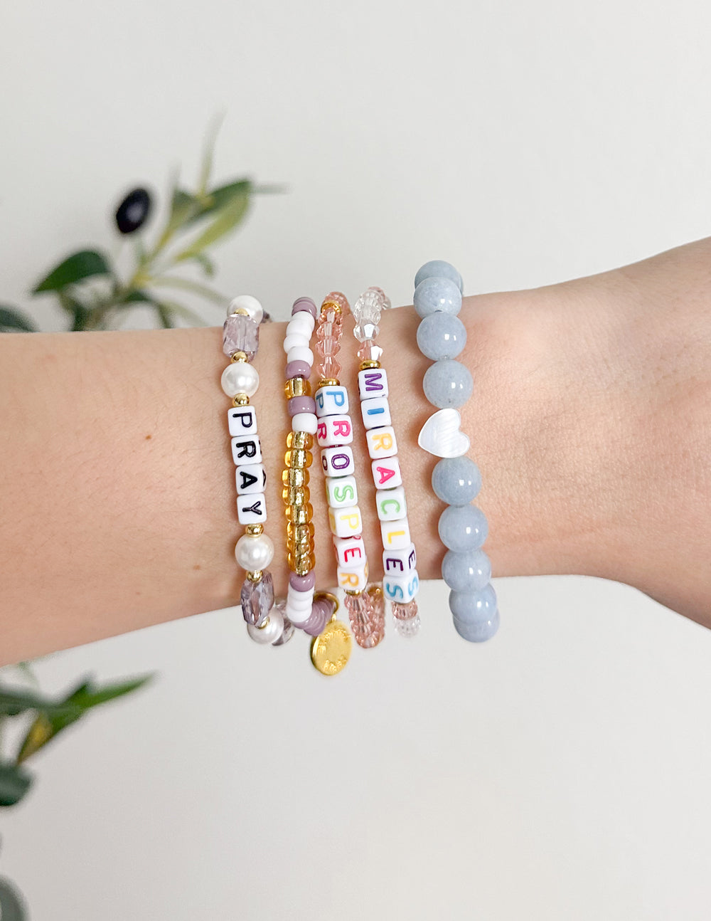 Elevated Faith Pray Pearl Letter Bracelet — detail close-up