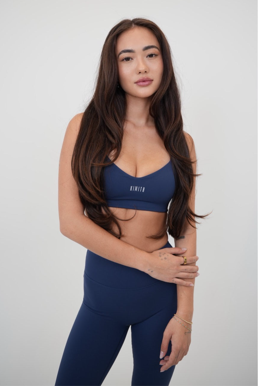 KIMITH BRAND I Live in Luxury Navy Blue Sports Bra — main product shot