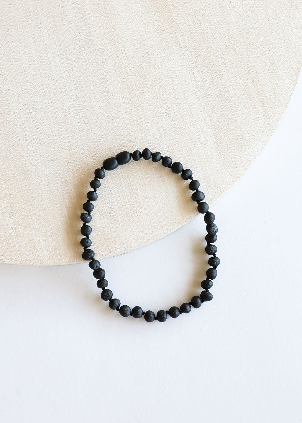 CanyonLeaf Raw Black Baltic Amber || Necklace — detail close-up