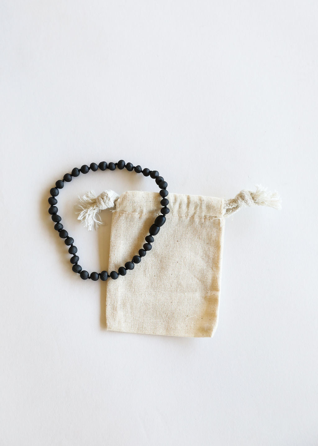CanyonLeaf Raw Black Baltic Amber || Necklace — lifestyle context