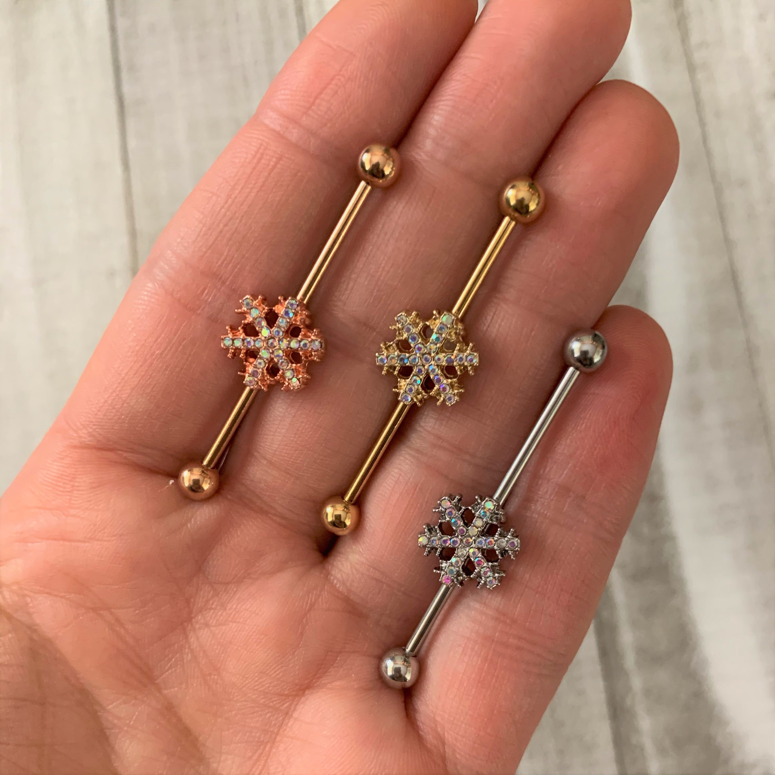 BodyCandy 14G Aurora Gem Rose Gold Tone Snowflake Industrial Barbell 38mm — detail close-up