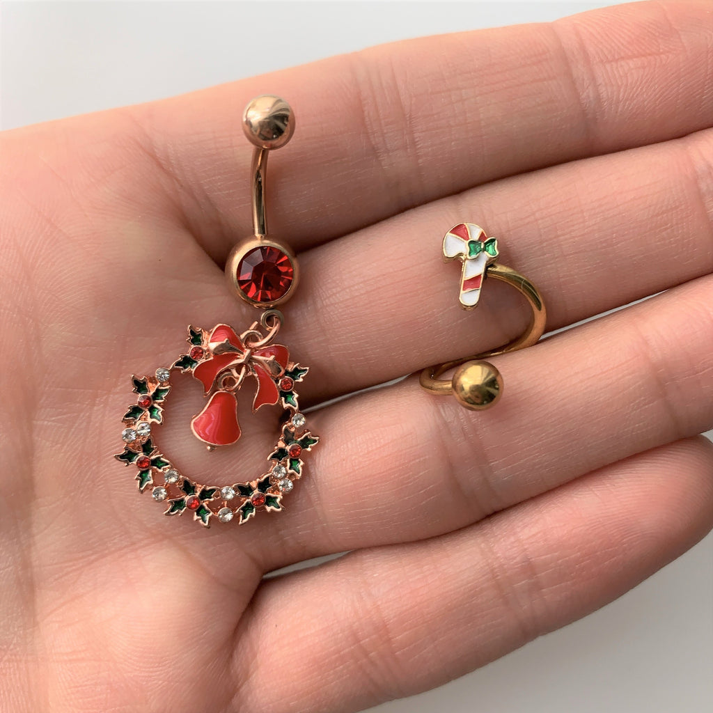 BodyCandy Red Gem Rose Gold Tone Holiday Wreath Christmas Dangle Belly Ring — lifestyle context
