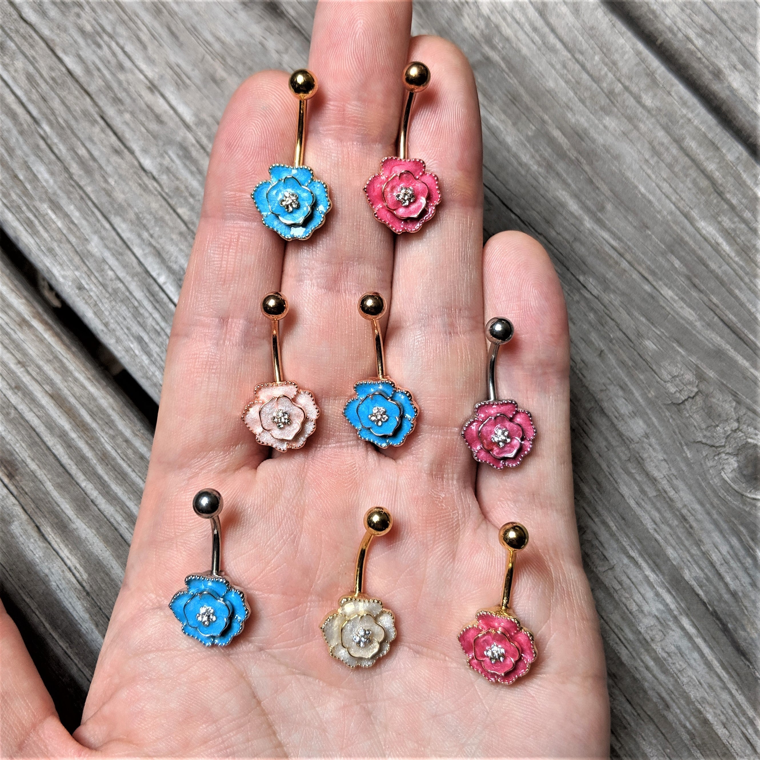 BodyCandy Clear Gem Rose Gold Tone Aqua Rose Reversible Belly Ring — detail close-up
