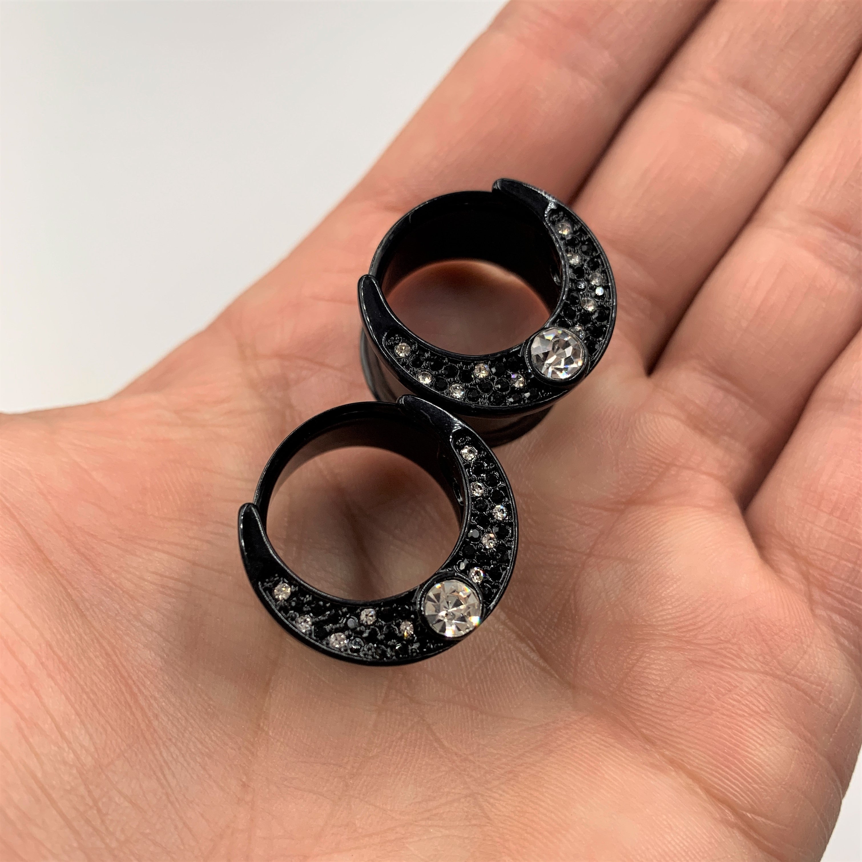 BodyCandy Clear Gem Black Crescent Moon Double Flare Tunnel Plug Set — detail close-up