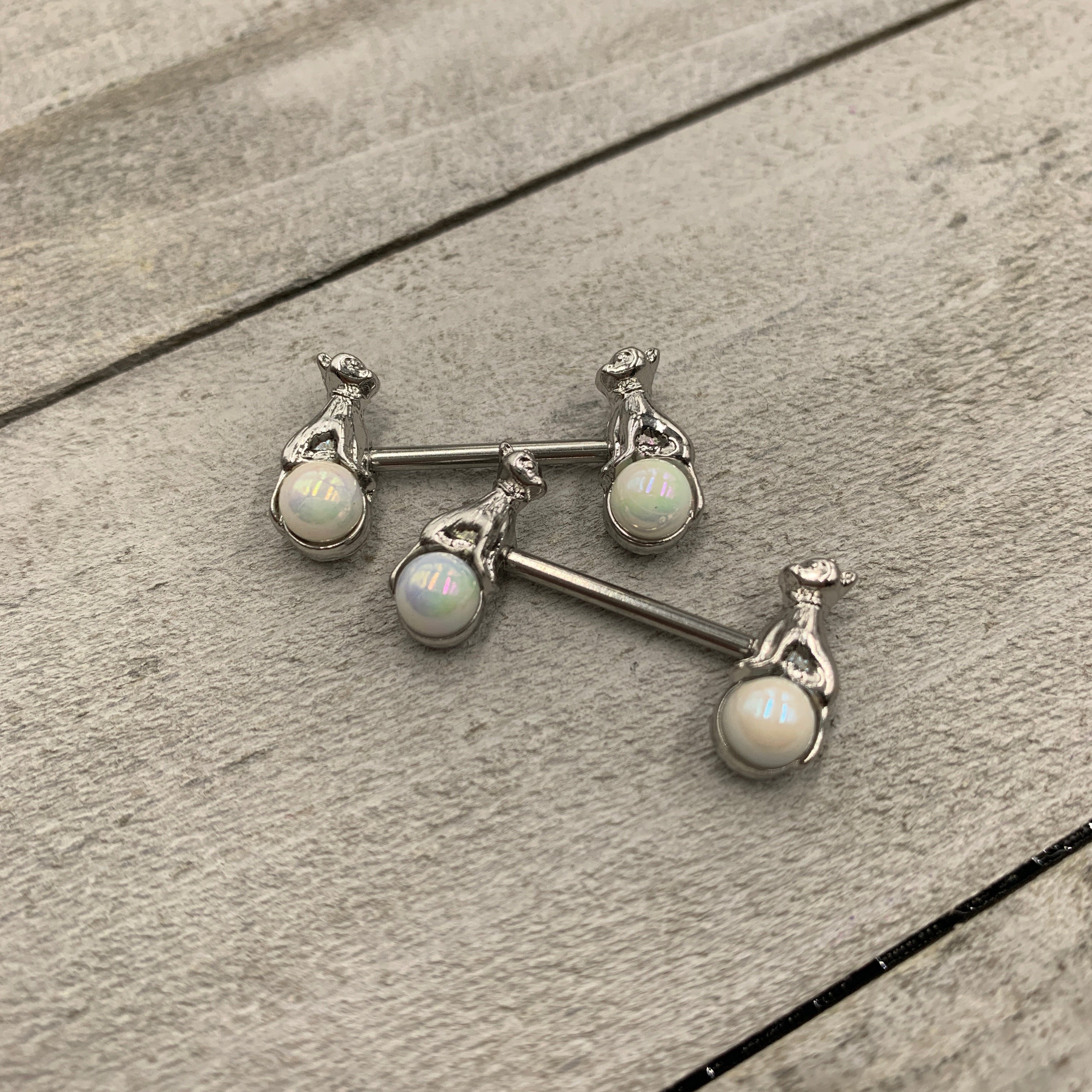 BodyCandy 14G 9/16 White Orb Baby Bear Barbell Nipple Ring Set — detail close-up