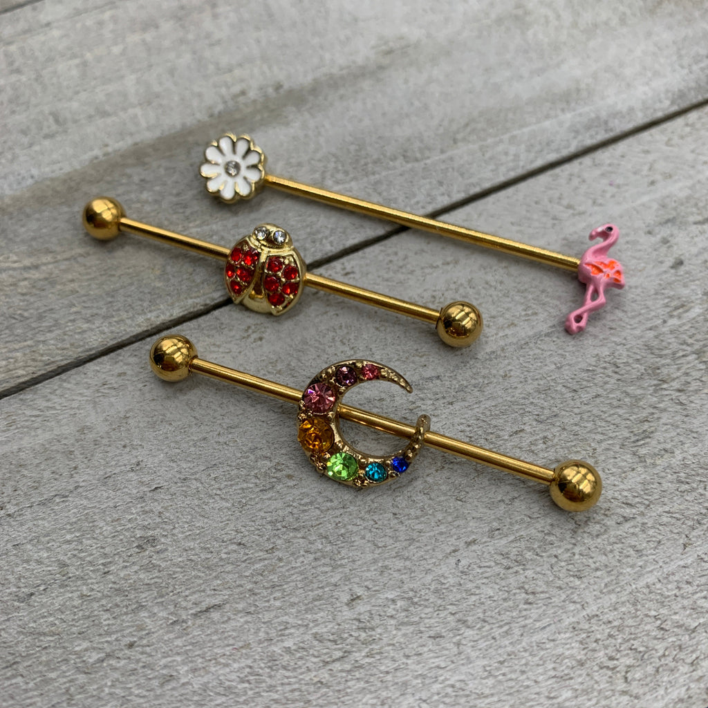 BodyCandy 14G Clear Gem Gold Hue Flower Flamingo Industrial Barbell 38mm — detail close-up