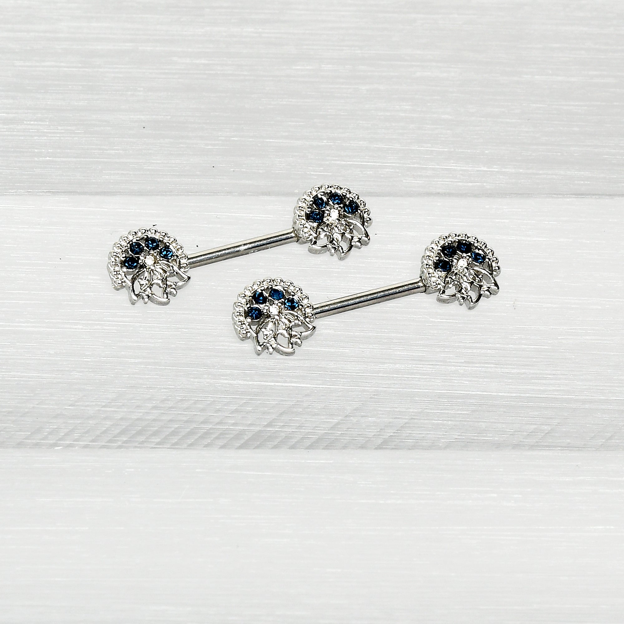BodyCandy 14G 1/2 Blue Clear Gem Abstract Arch Barbell Nipple Ring Set — size reference