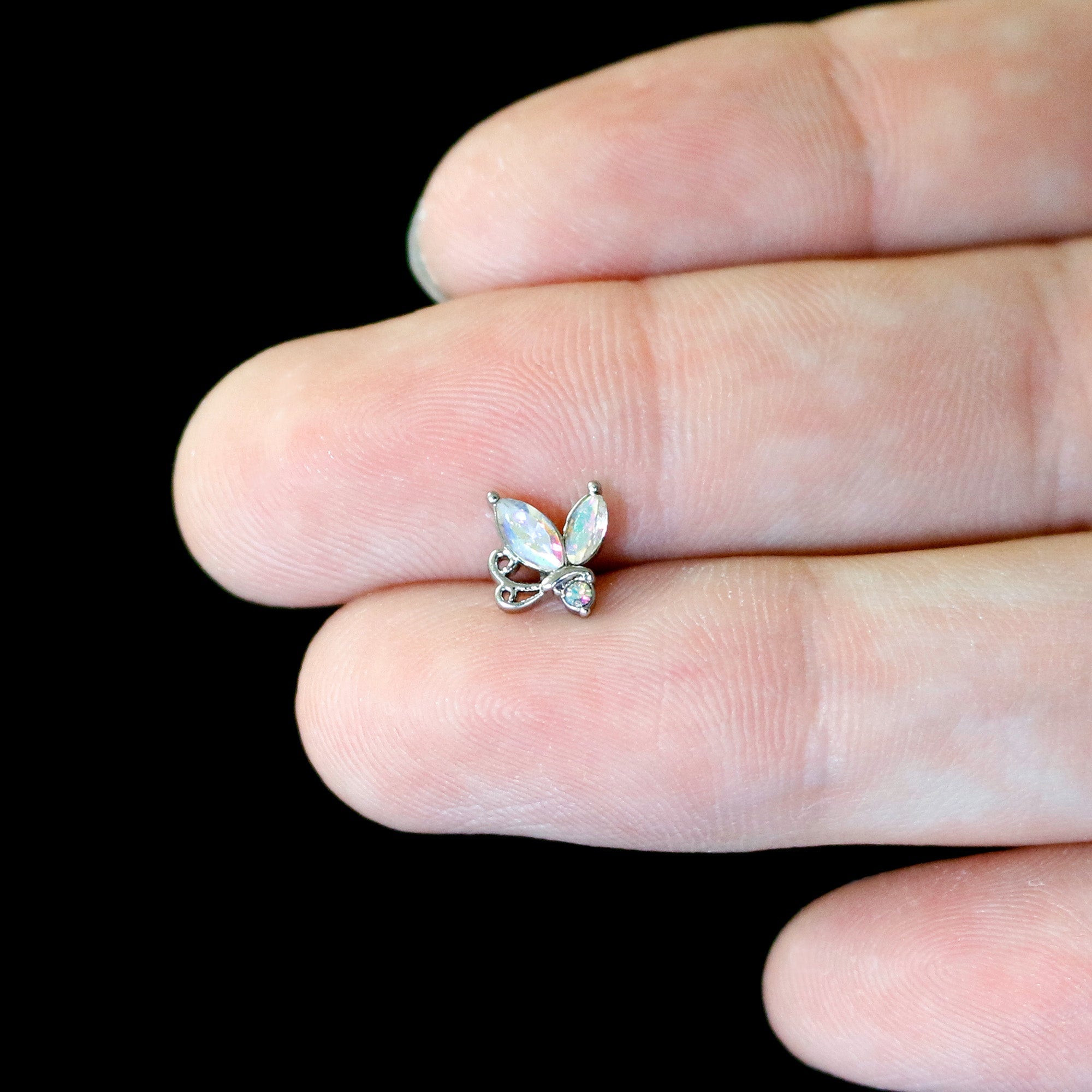BodyCandy 16G 5/16 Aurora CZ Gem Fleur de Lis Butterfly Labret Monroe Tragus — in-use photo