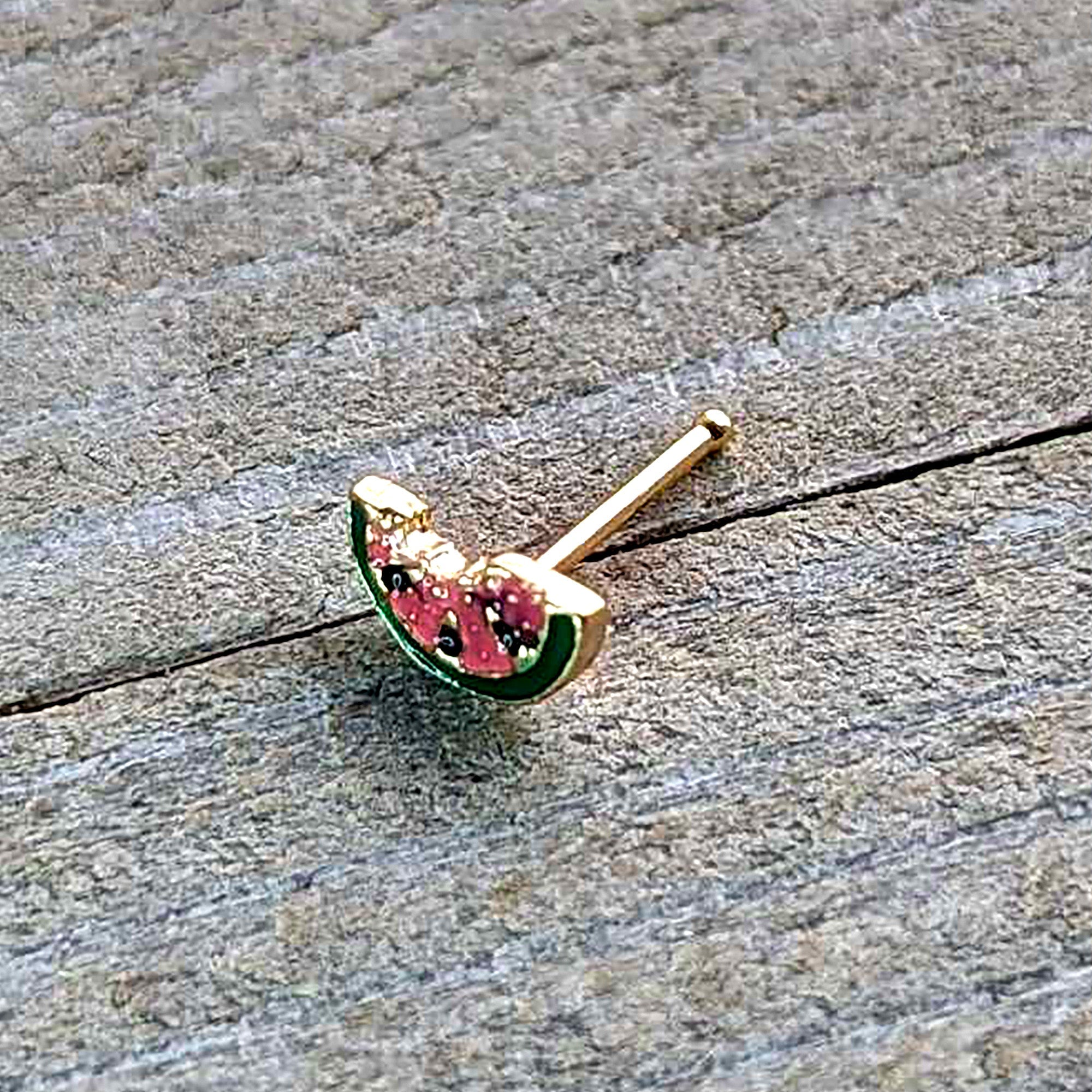 BodyCandy 20G 1/4 Gold Tone Watermelon Bite Nose Bone — in-use photo