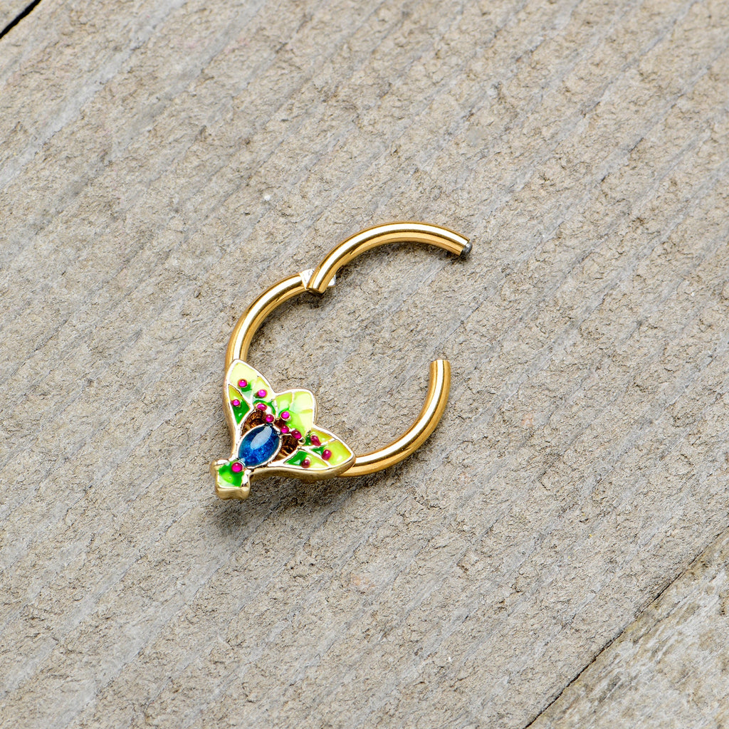 BodyCandy 16G 3/8 Blue Gem Gold Tone Tropic Fan Hinged Segment Ring — in-use photo