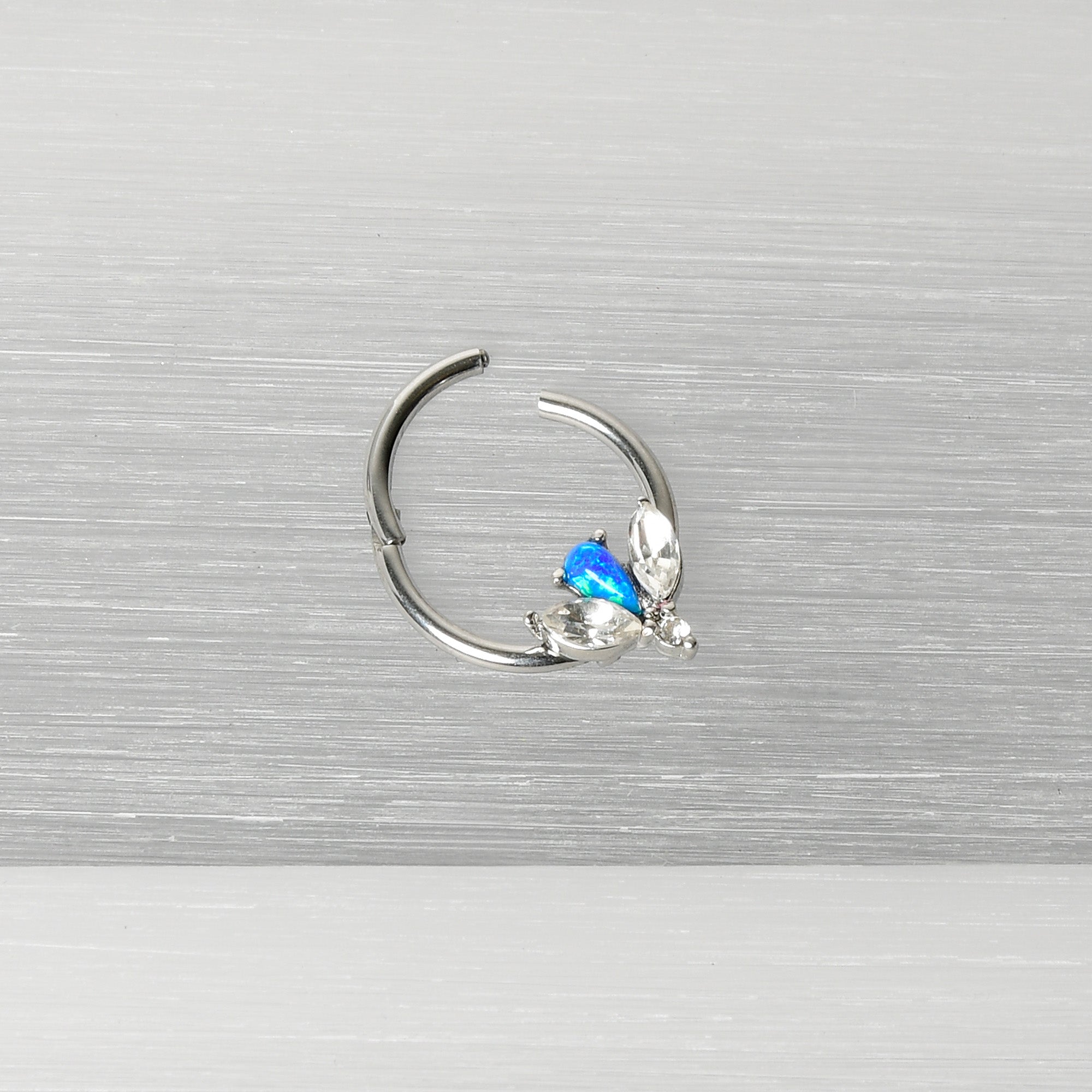 BodyCandy 16G 3/8 Blue Faux Opal Style Flower Hinged Segment Ring — alternative angle