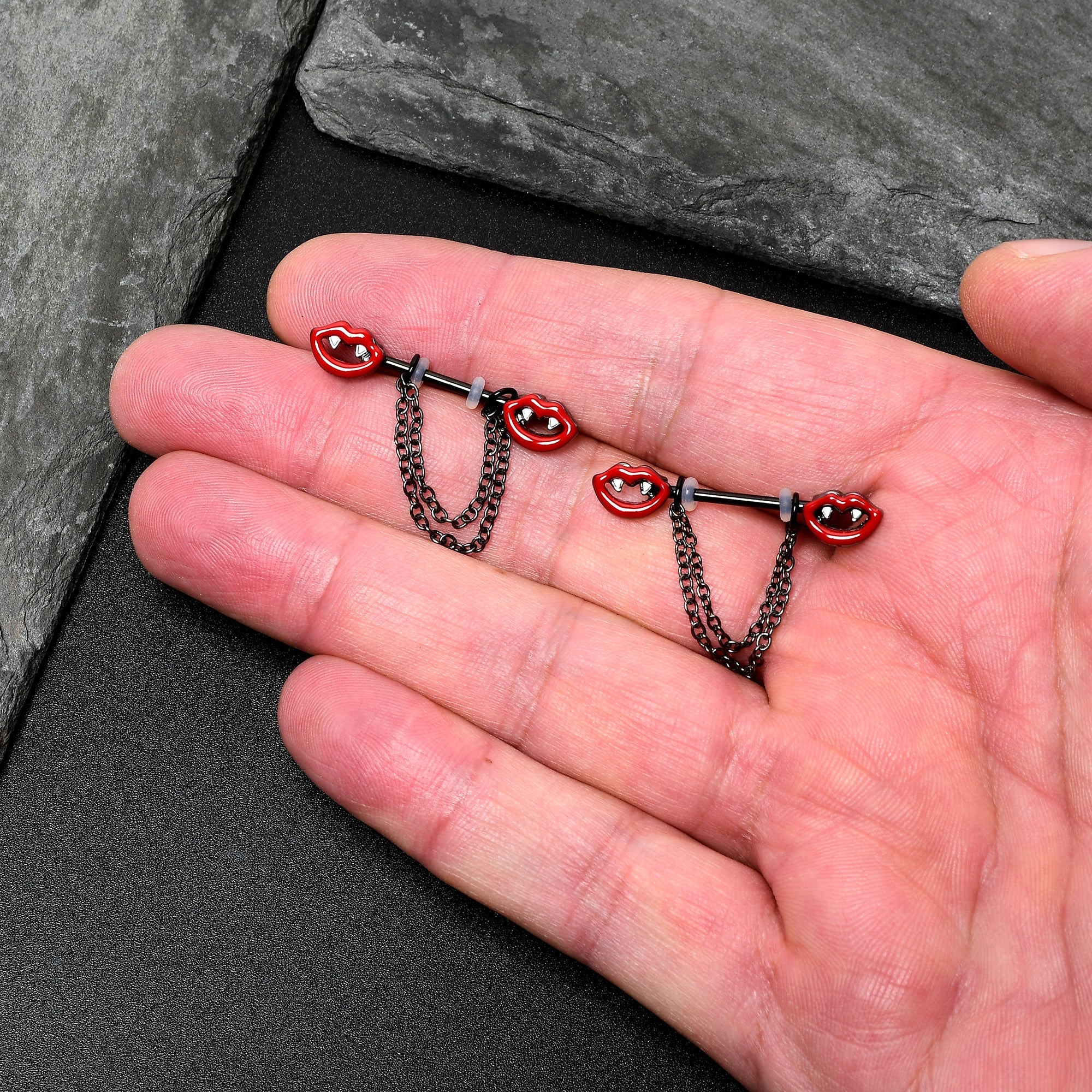BodyCandy 14G 11/16 Black Vampire Fangs Chain Dangle Nipple Ring Set — detail close-up
