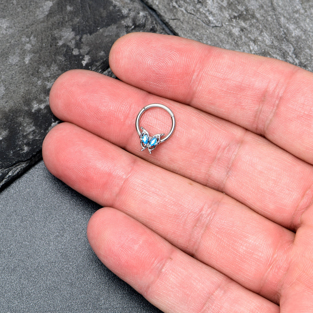 BodyCandy 16G 3/8 Blue Gem Fancy Fab Butterfly Hinged Segment Ring — lifestyle context