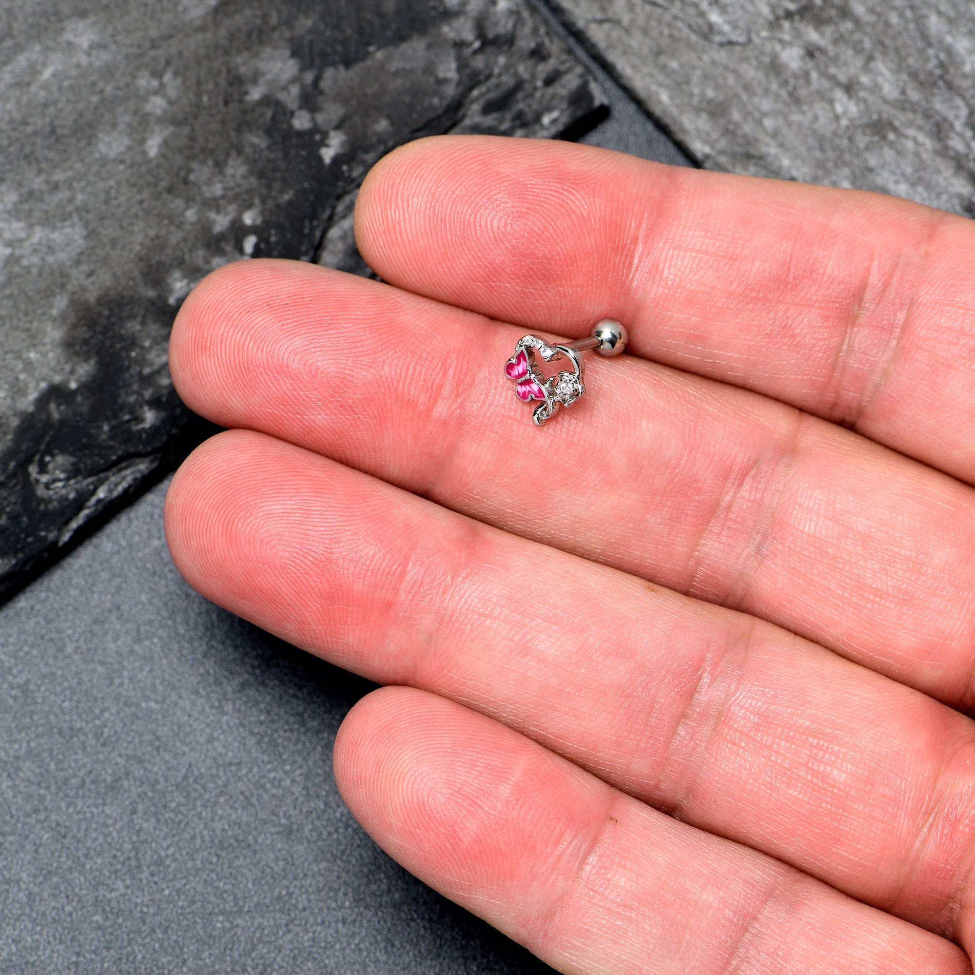 BodyCandy 16G 1/4 Clear CZ Gem Butterfly Rose Pink Cartilage Tragus Stud — side view