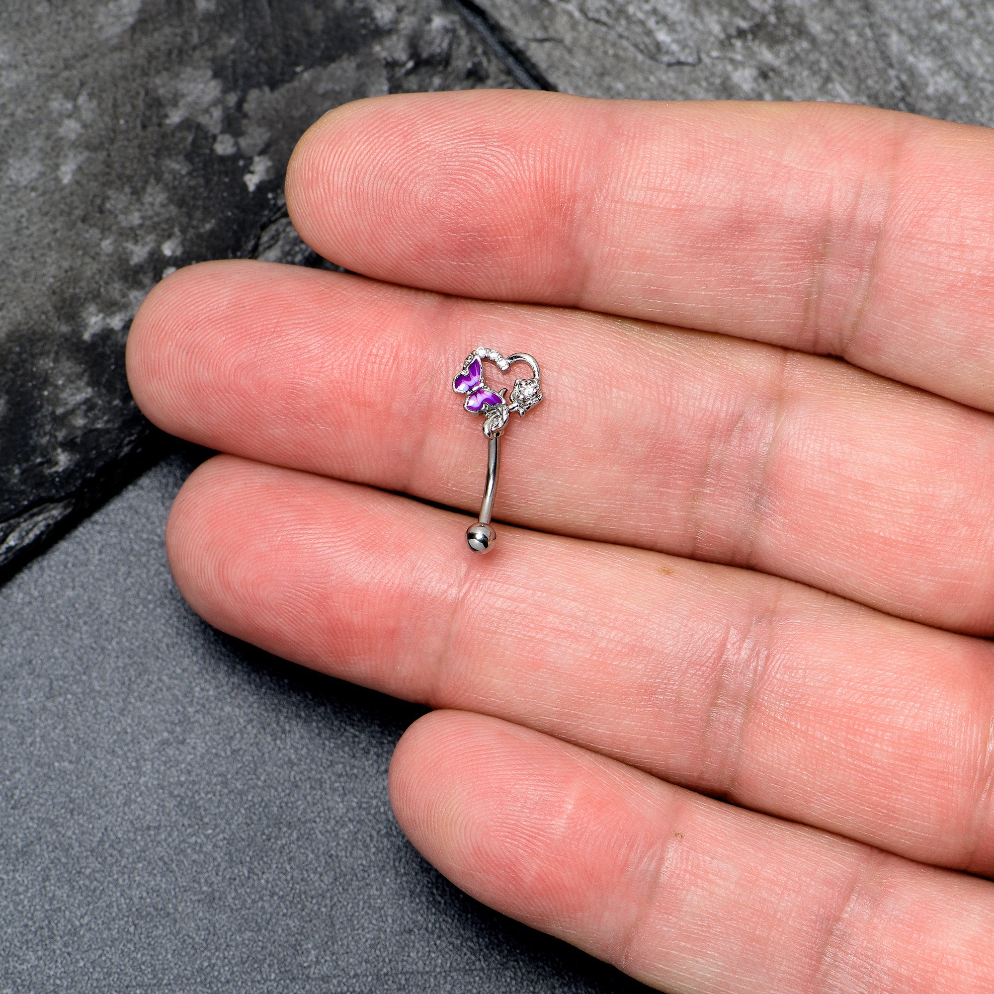 BodyCandy 16G 5/16 Clear CZ Gem Butterfly Rose Purple Curved Eyebrow Ring — detail close-up