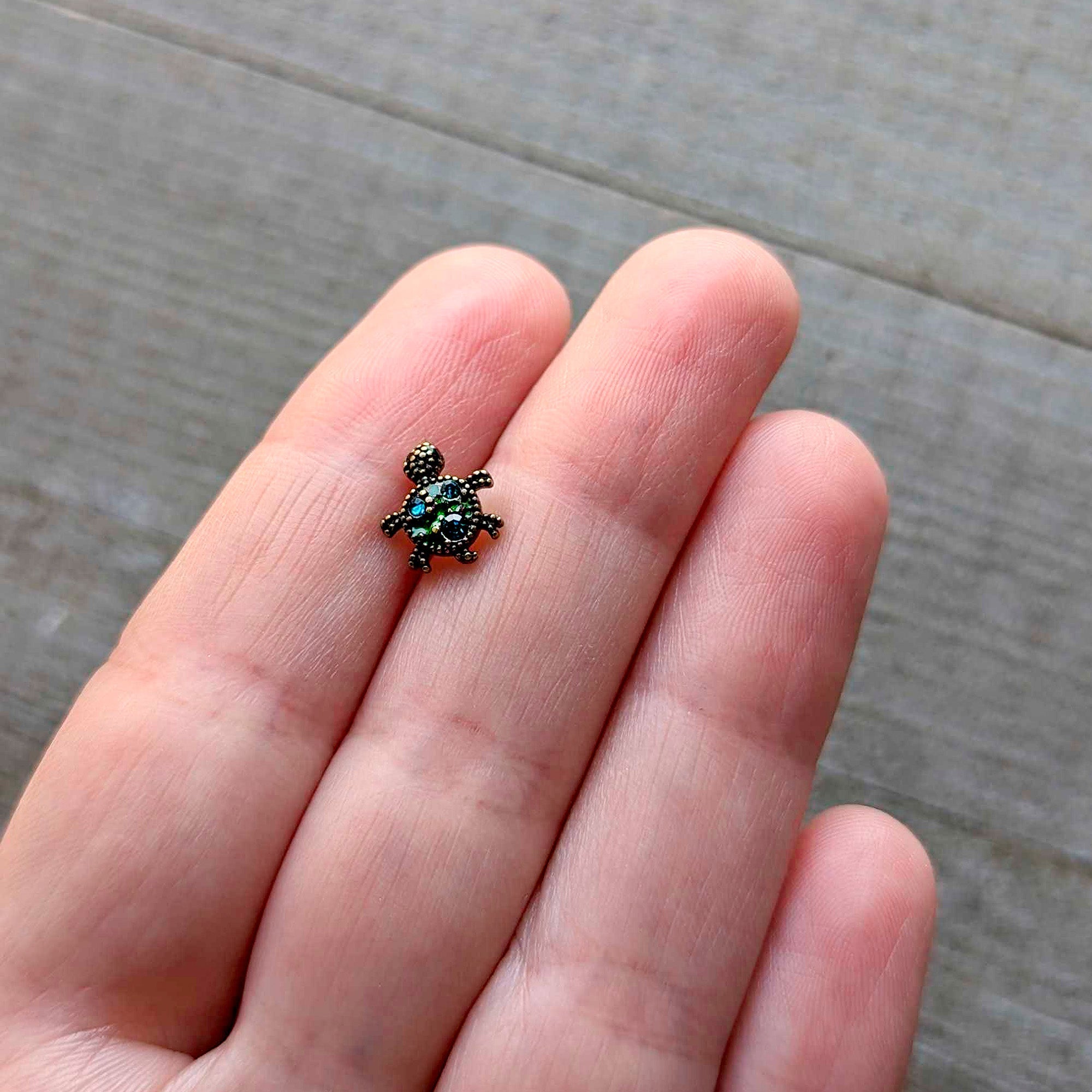BodyCandy 16G 1/4 Blue Gem Gold Hue Sweet Sea Turtle Cartilage Tragus Earring — back view
