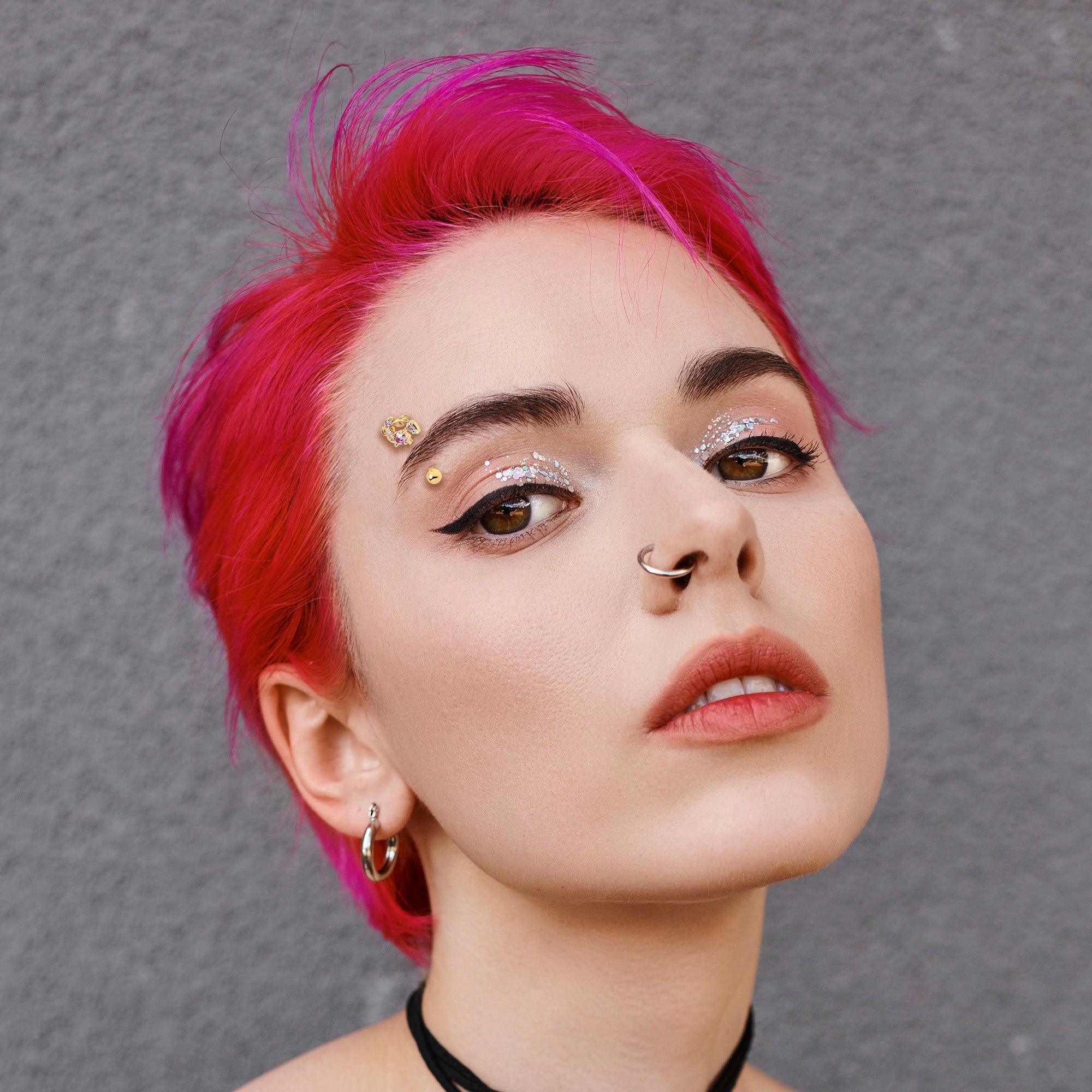 BodyCandy 16G 5/16 Pink Gem Gold Tone Twining Vine Curved Eyebrow Ring — lifestyle context