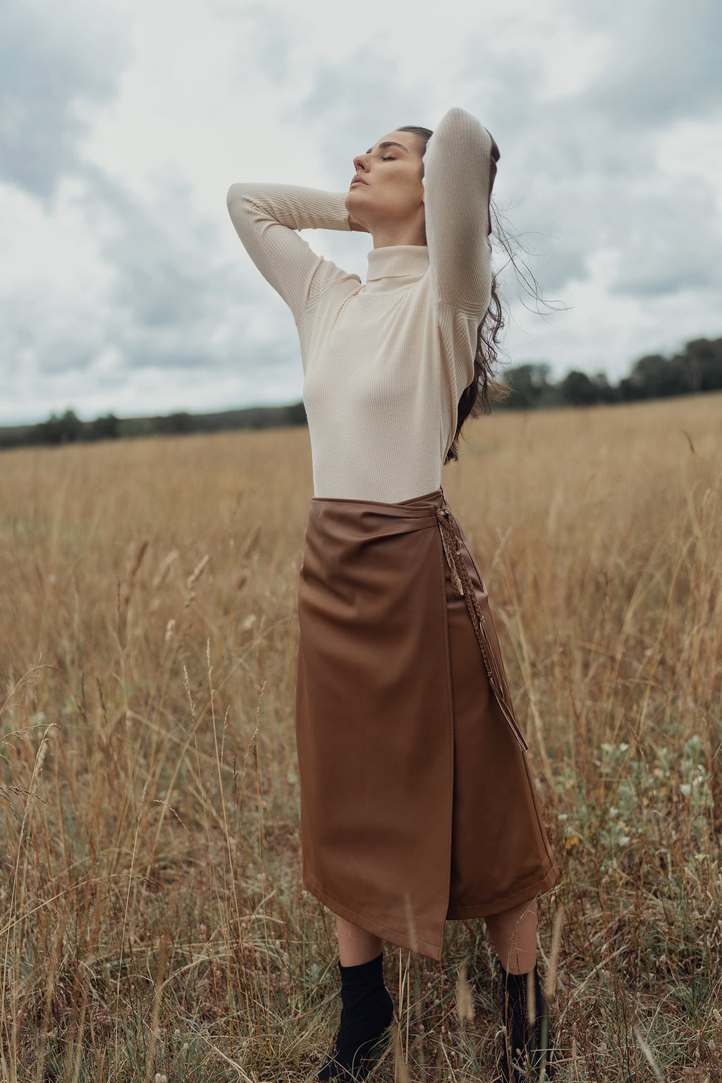 profile-nyc LEATHER FAUX WRAP SKIRT — lifestyle worn / used context