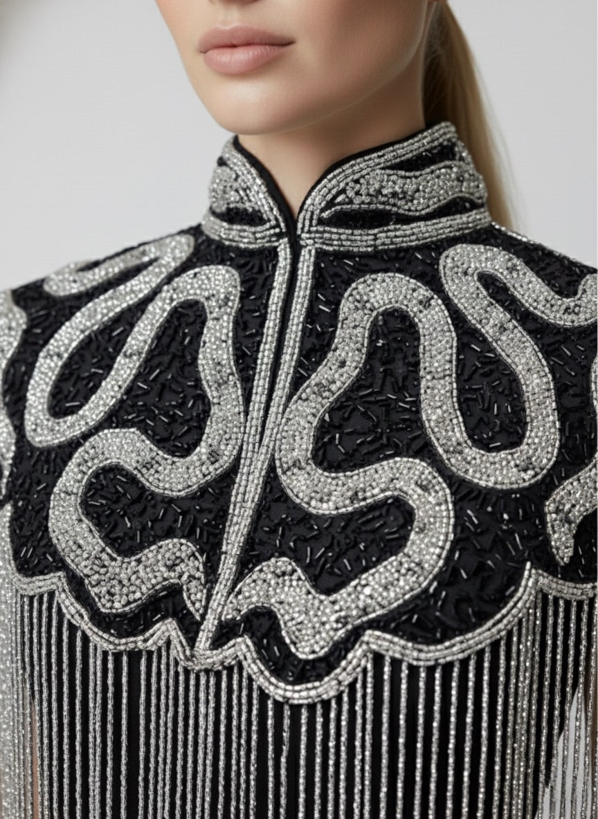 L'Jai Amor Noir Sovereign Cape — detail close-up
