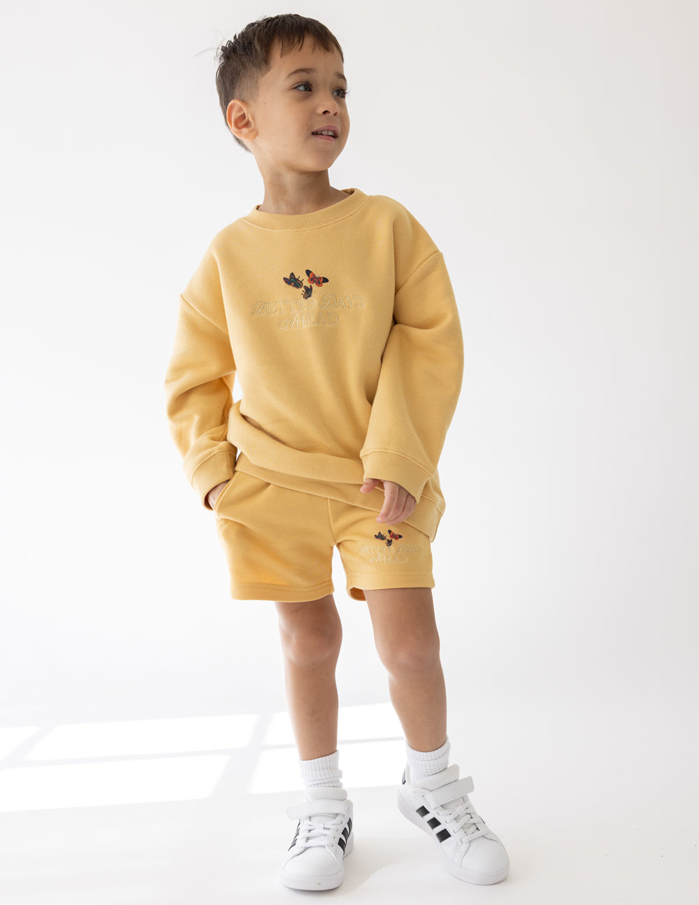 Elevated Faith Better Days Butterfly Kids Crewneck — lifestyle context