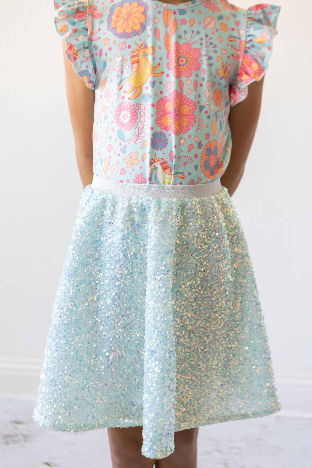 Mila & Rose ® SALE Blue Retro Unicorns S/S Ruffle Tee — side view