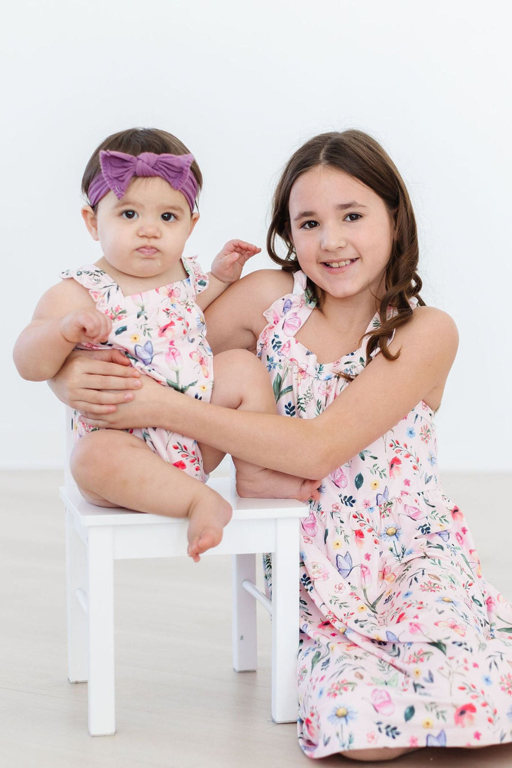 Mila & Rose ® Butterfly Meadows Ruffle Cross Back Romper — detail close-up