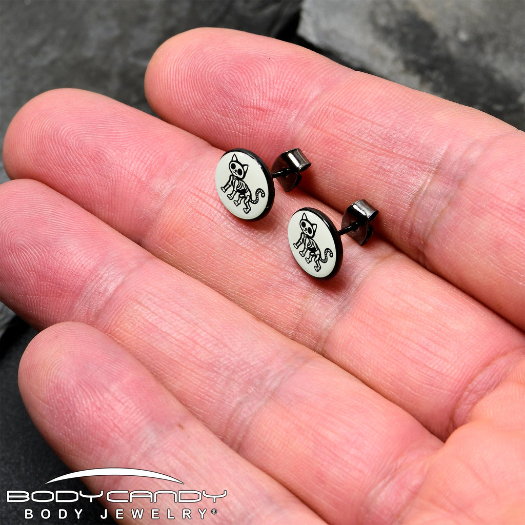 BodyCandy Black Anodized Skeleton Kitty Cat Glow in the Dark Stud Earrings by Onyx O — detail close-up
