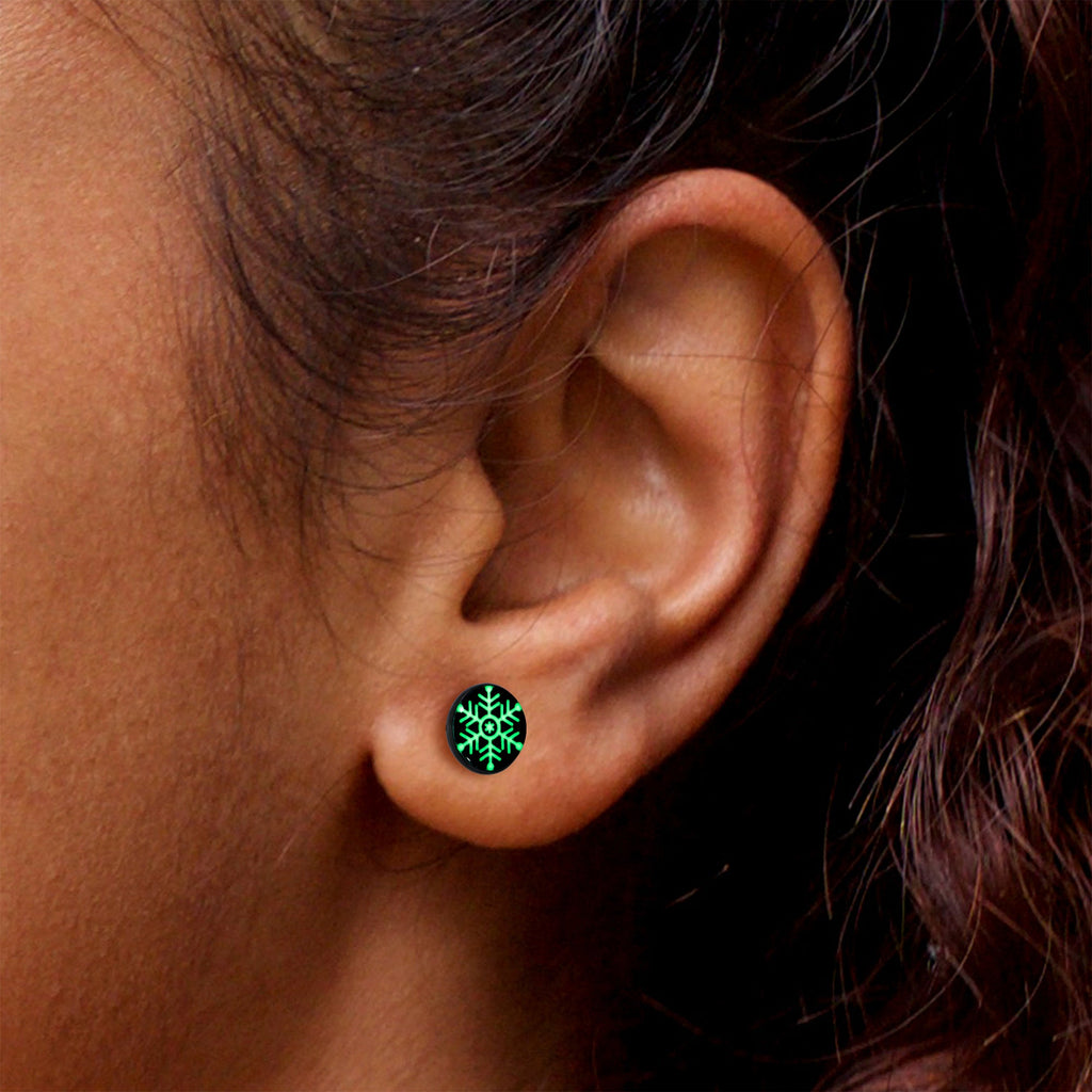 BodyCandy Black Anodized Glow in the Dark Holiday Snowflake Stud Earrings by Onyx O — in-use photo