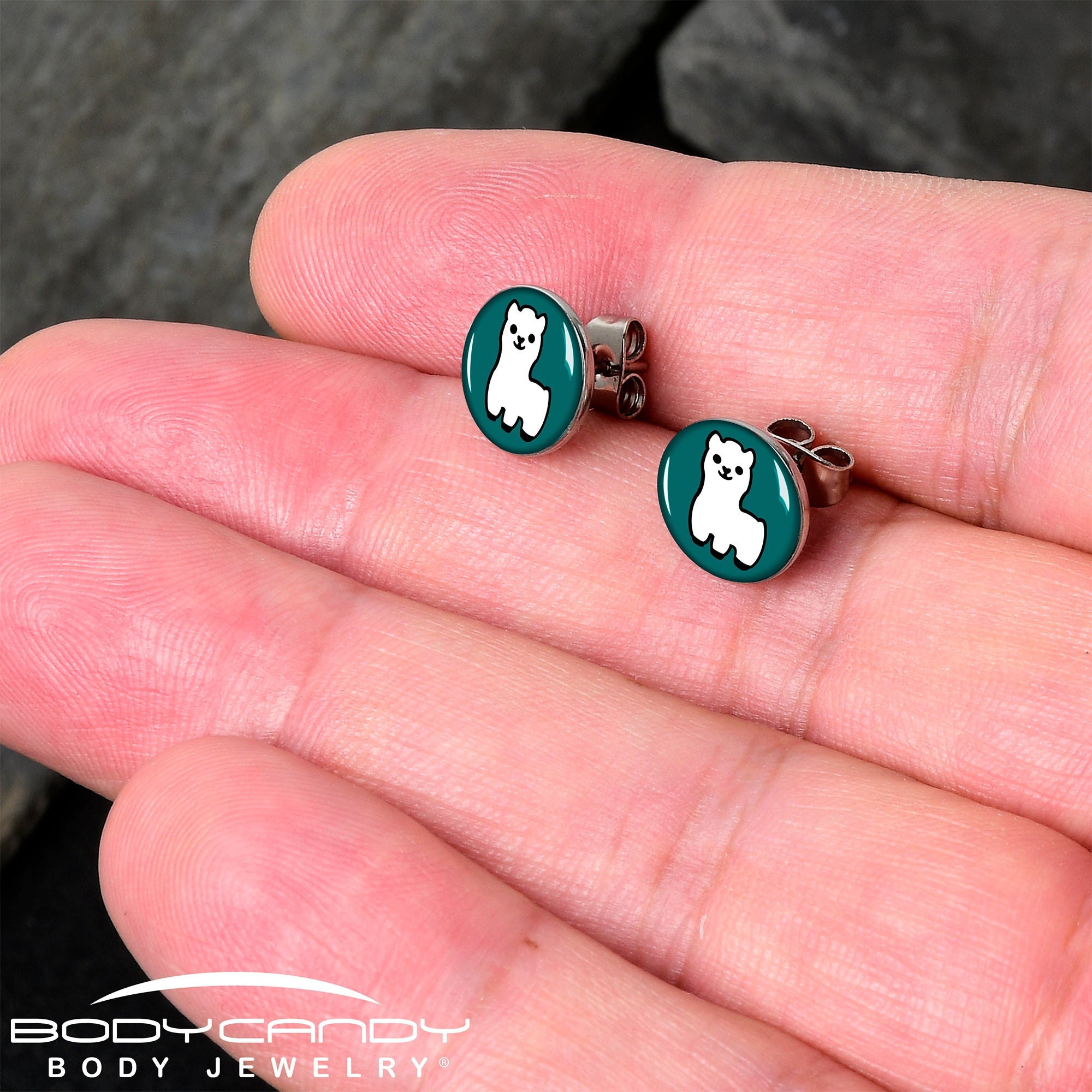 BodyCandy White Llama Stud Earrings by Onyx O — detail close-up
