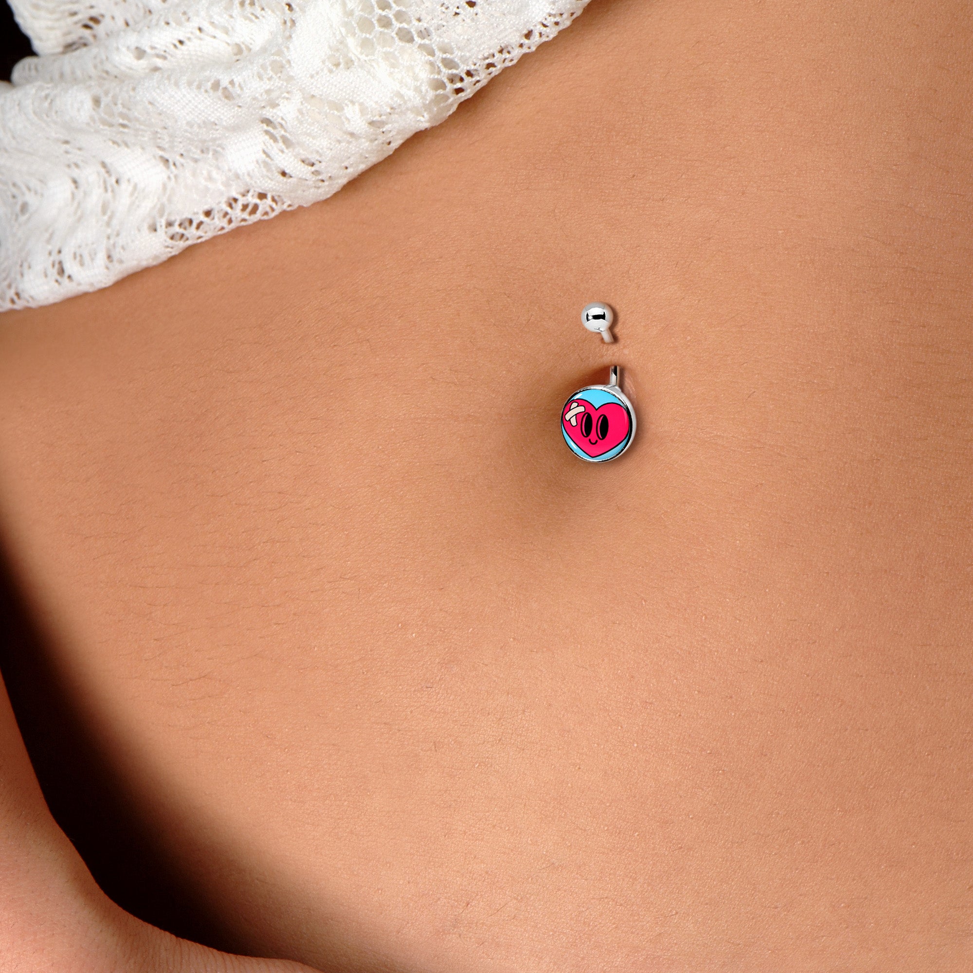 BodyCandy Bandaged Heartbreak Heart Belly Ring by Onyx O — detail close-up