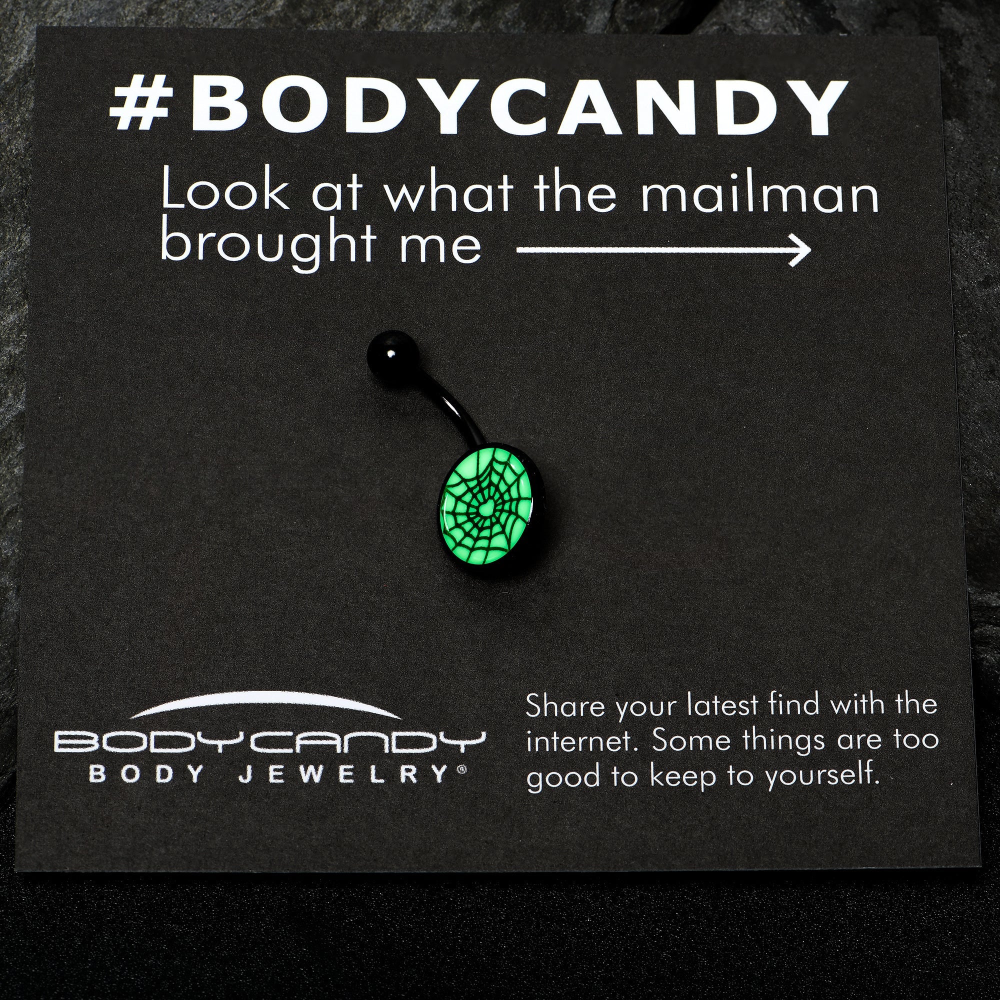 BodyCandy Black Glow in the Dark Heart Spider Web Belly Ring by Onyx O — in-use photo