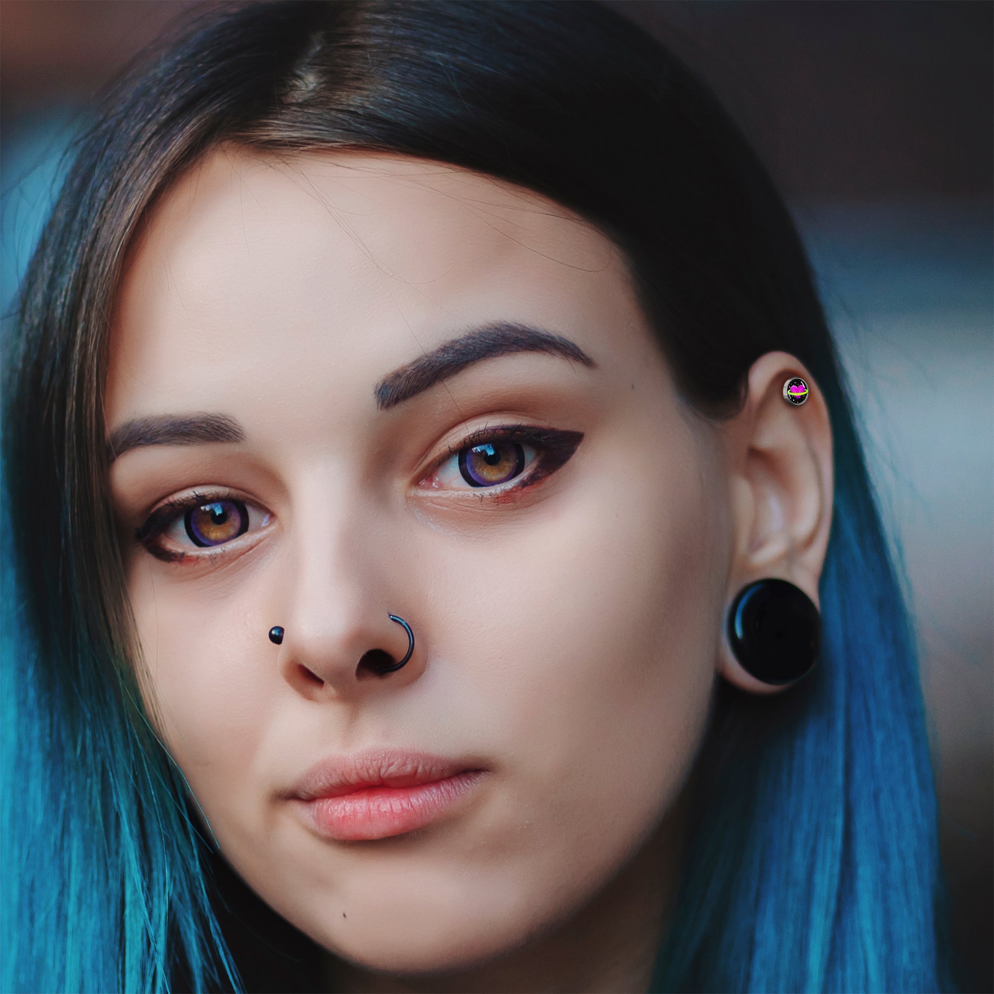 BodyCandy 16G 1/4 Heart Planet Cartilage Tragus Earring by Onyx O — lifestyle context