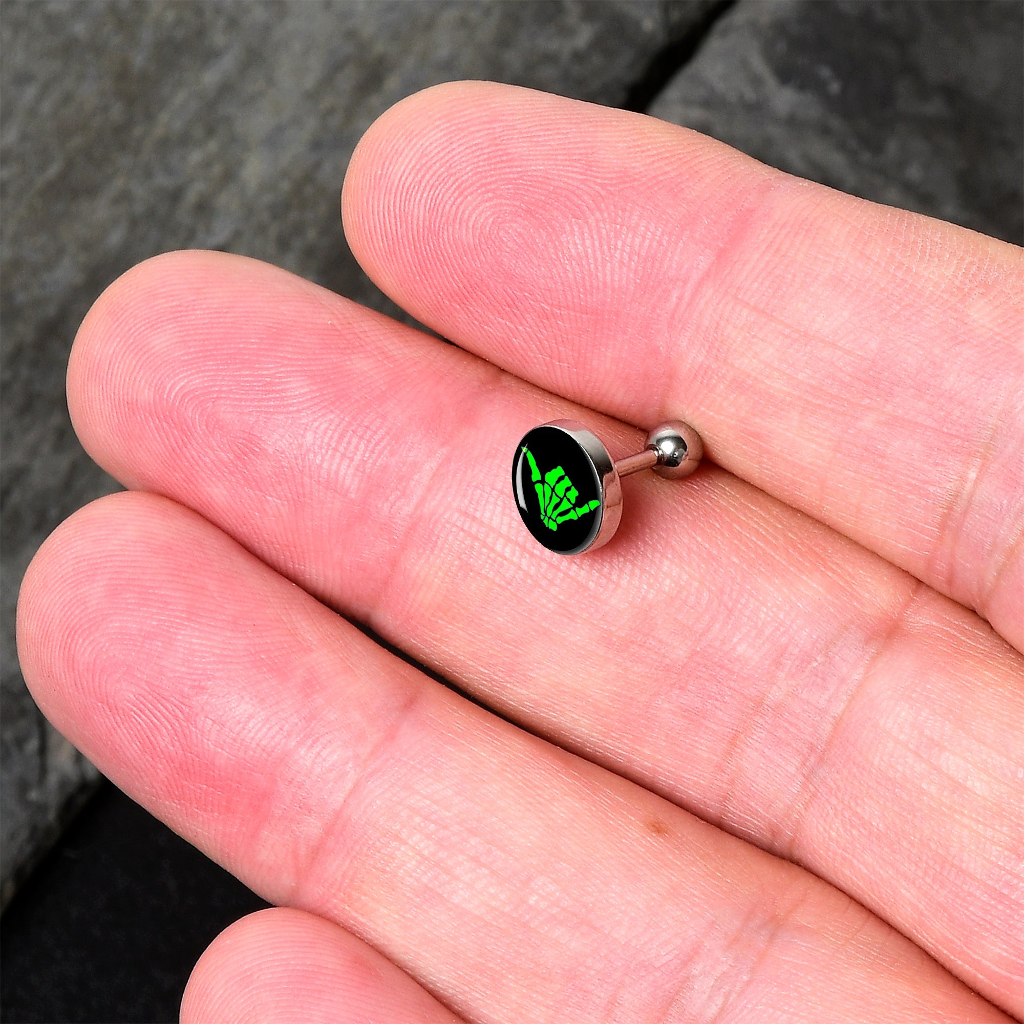 BodyCandy 16G 1/4 Shaka Hand Cartilage Tragus Earring by Onyx O — detail close-up