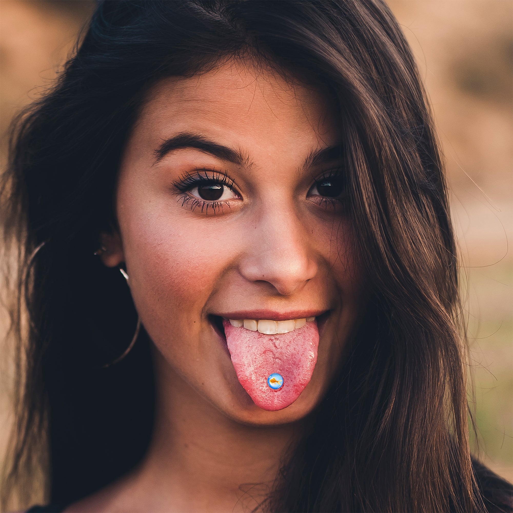 BodyCandy Gold Fish Barbell Tongue Ring by Onyx O — lifestyle context