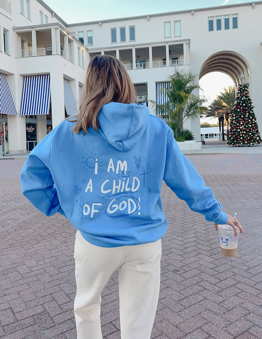 Elevated Faith Child of God Unisex Hoodie — lifestyle context