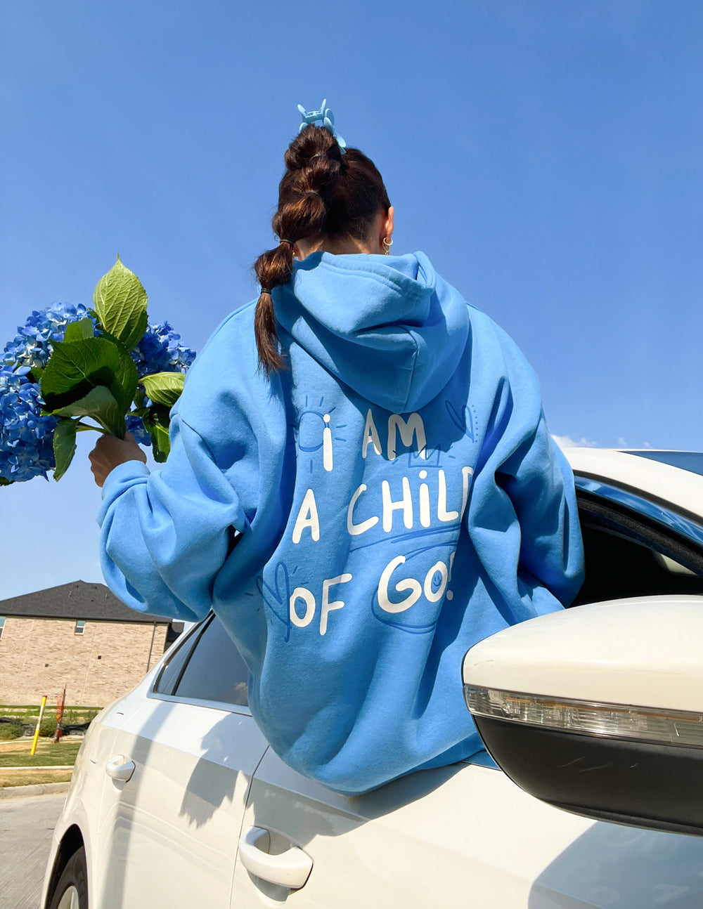 Elevated Faith Child of God Unisex Hoodie — in-use photo