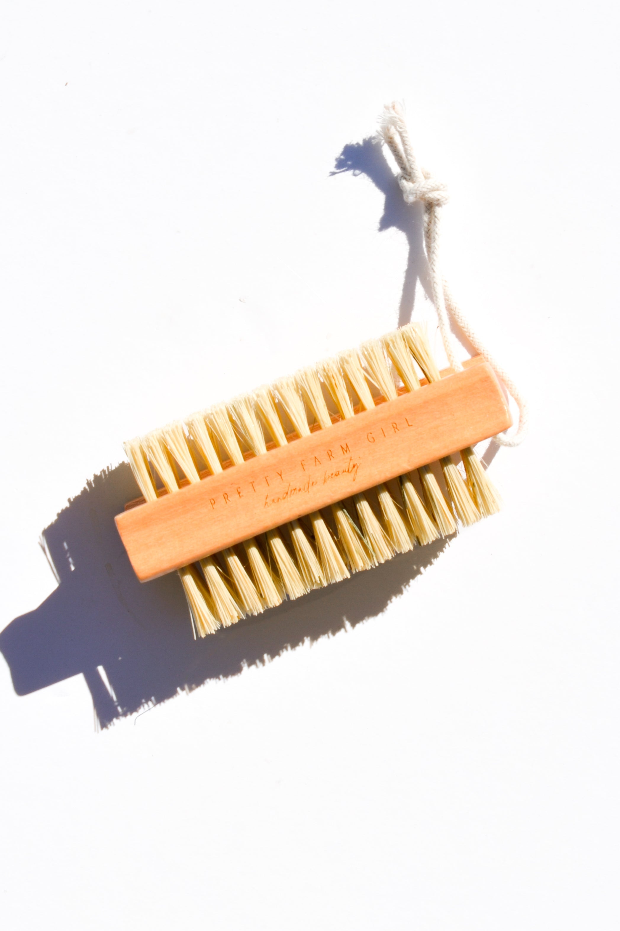 Pretty farm girl Bamboo Nail Brush With Sisal Bristles — main product shot