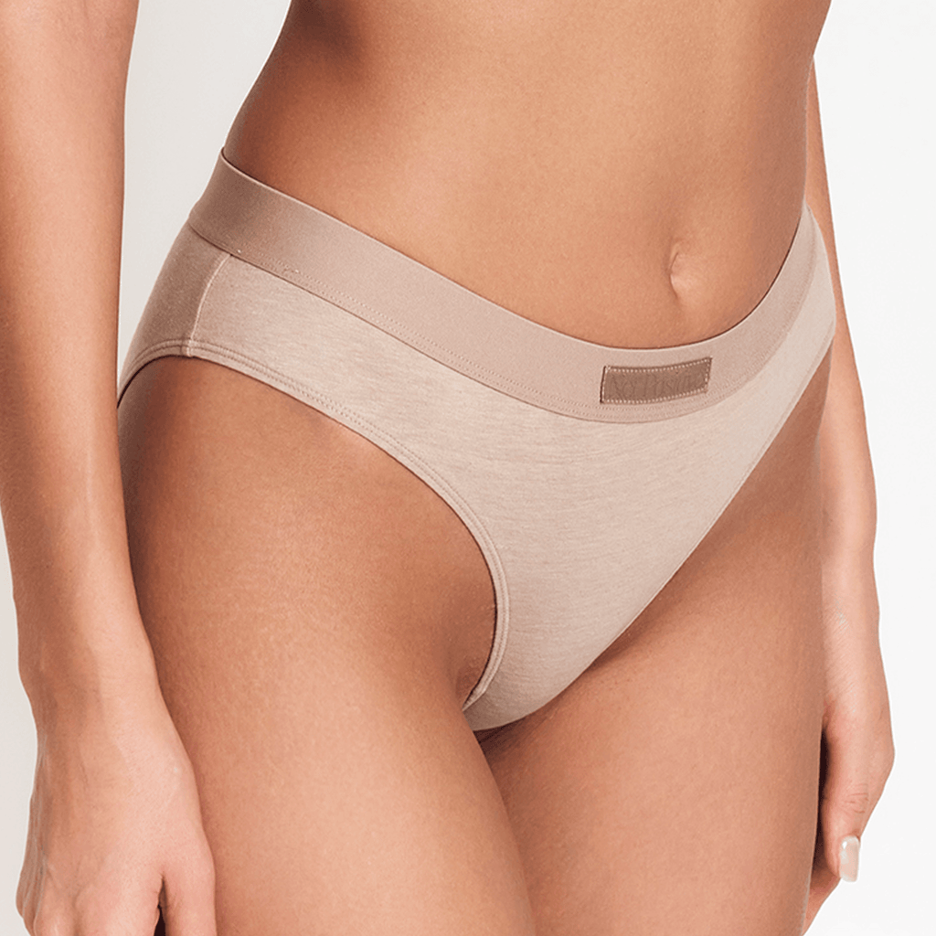 Net Positive Mid-Rise Brief 4-Pack — lifestyle context