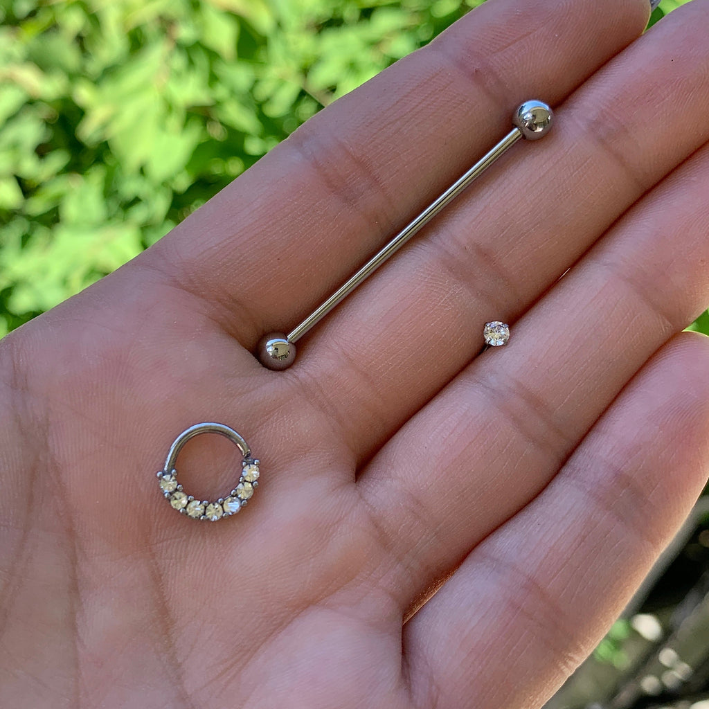 BodyCandy 16G 1/4 Solid 14K White Gold 3mm Clear Cubic Zirconia Bioplast Tragus Earring Stud — lifestyle context
