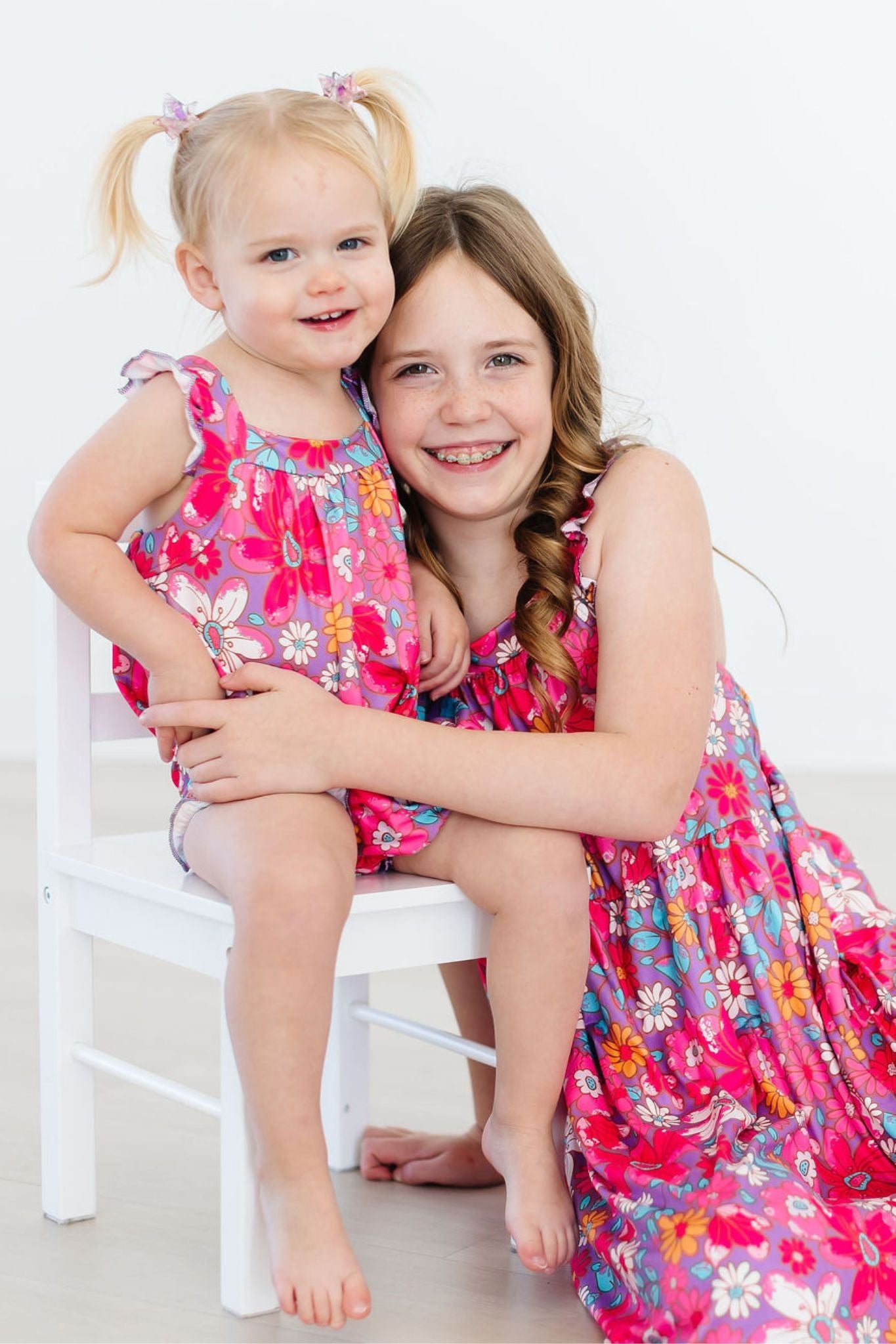 Mila & Rose ® Hawaiian Floral Ruffle Cross Back Romper — detail close-up