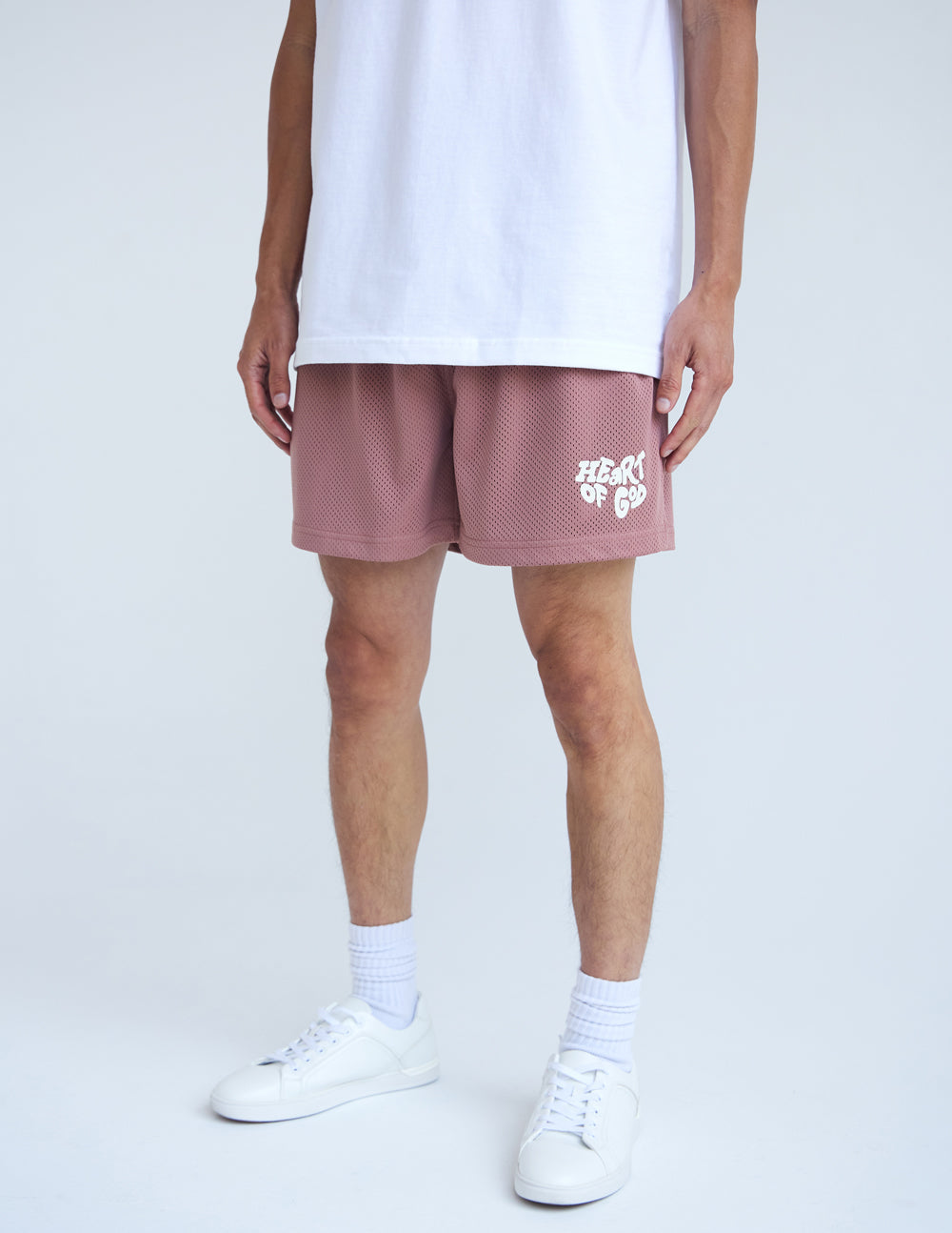 Elevated Faith Heart of God Unisex Mesh Short — lifestyle context