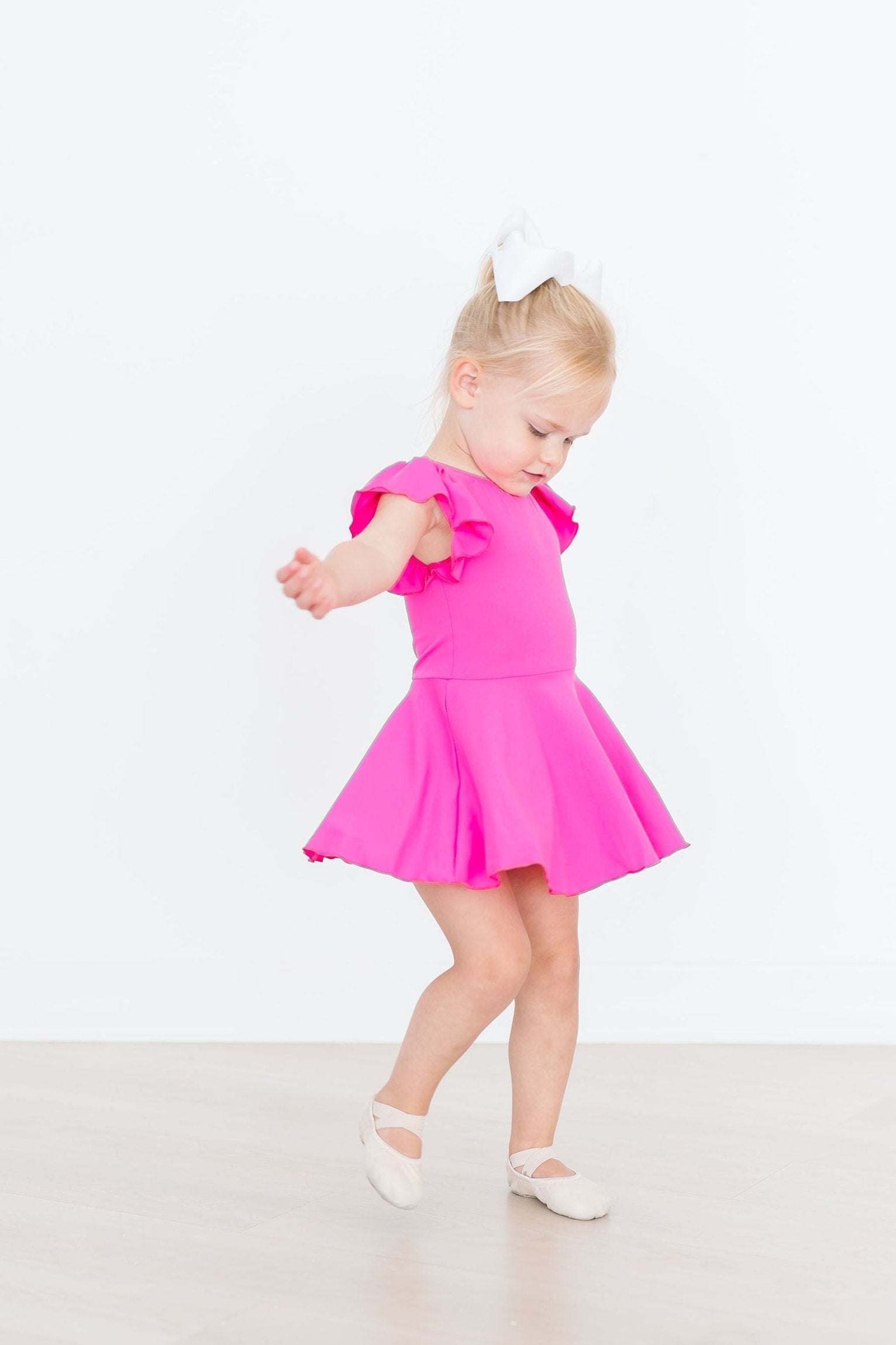 Mila & Rose ® Hot Pink S/S Twirl Leotard — lifestyle context